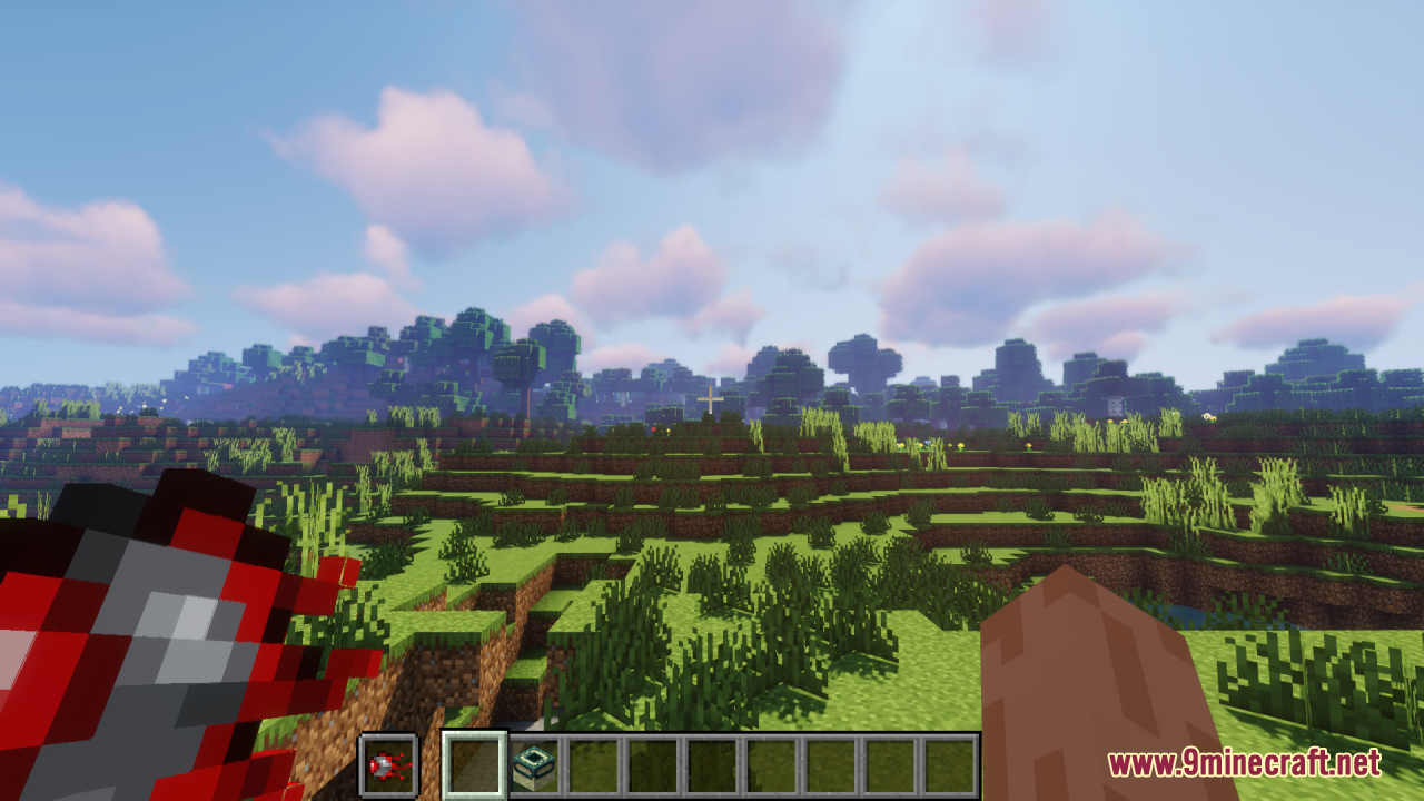 Mechanical Eye Resource Pack Screenshot 5 Player holding the custom mechanical eye item in a grassy landscape