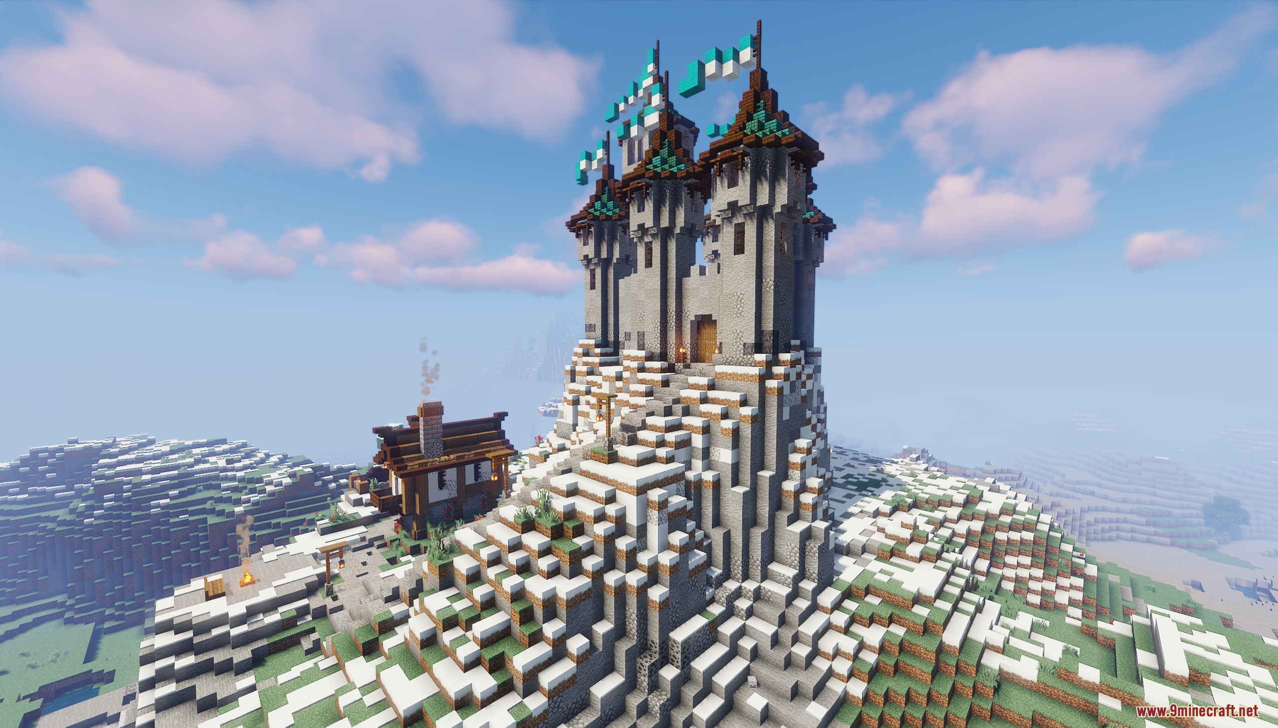 A medieval stone castle built on a snowy mountain peak