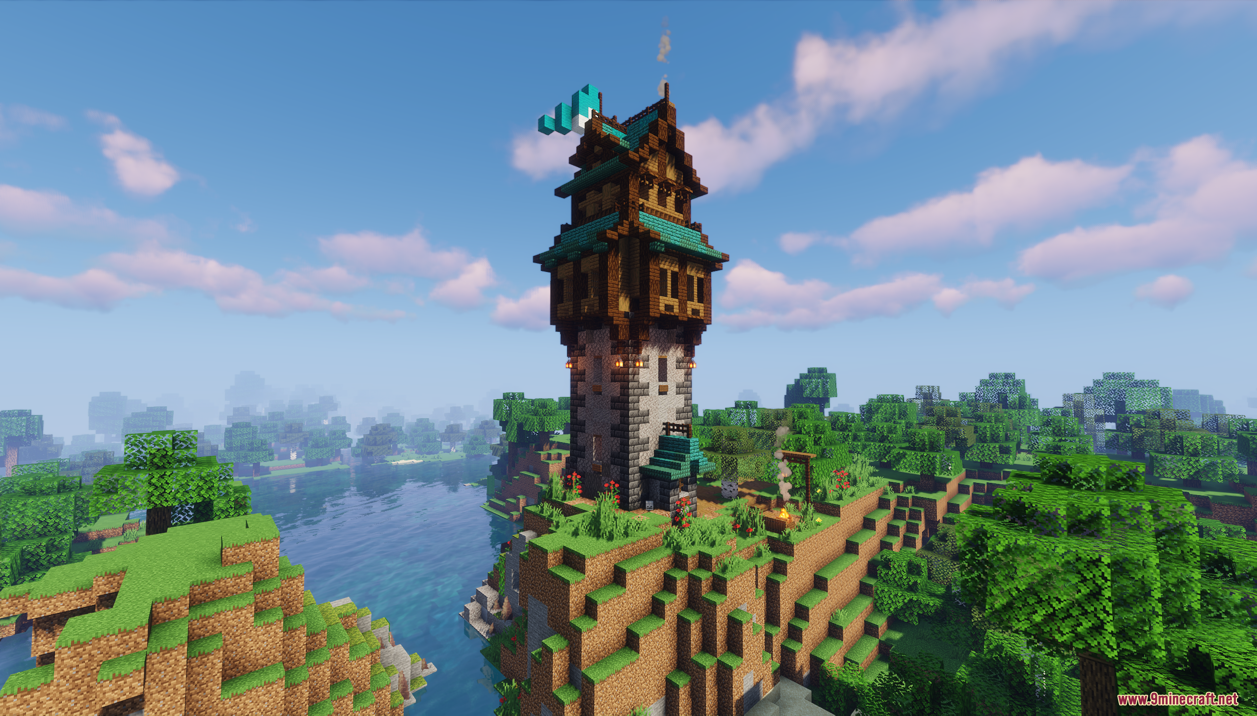 The fantasy tower stands on a cliff overlooking the water