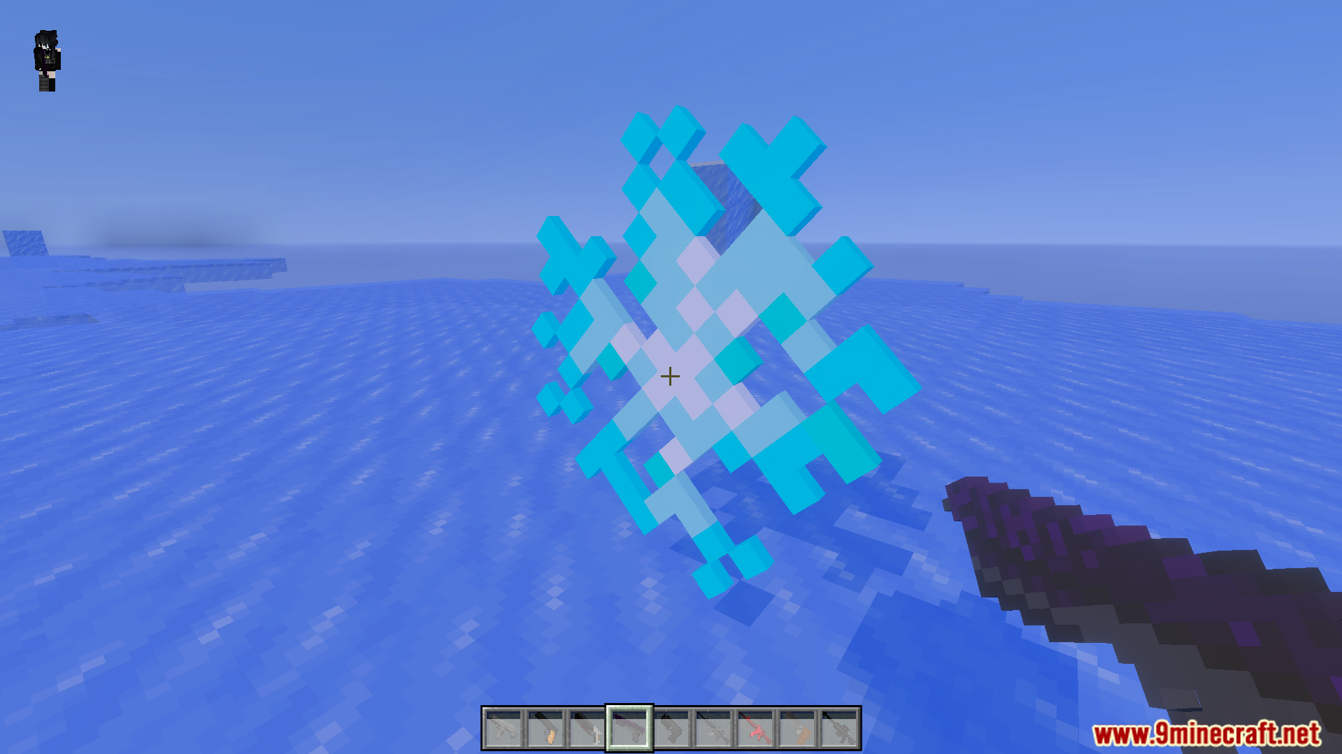 More Gun Classic Addon Screenshot 3 Player holding a gun aiming at a large snowflake structure