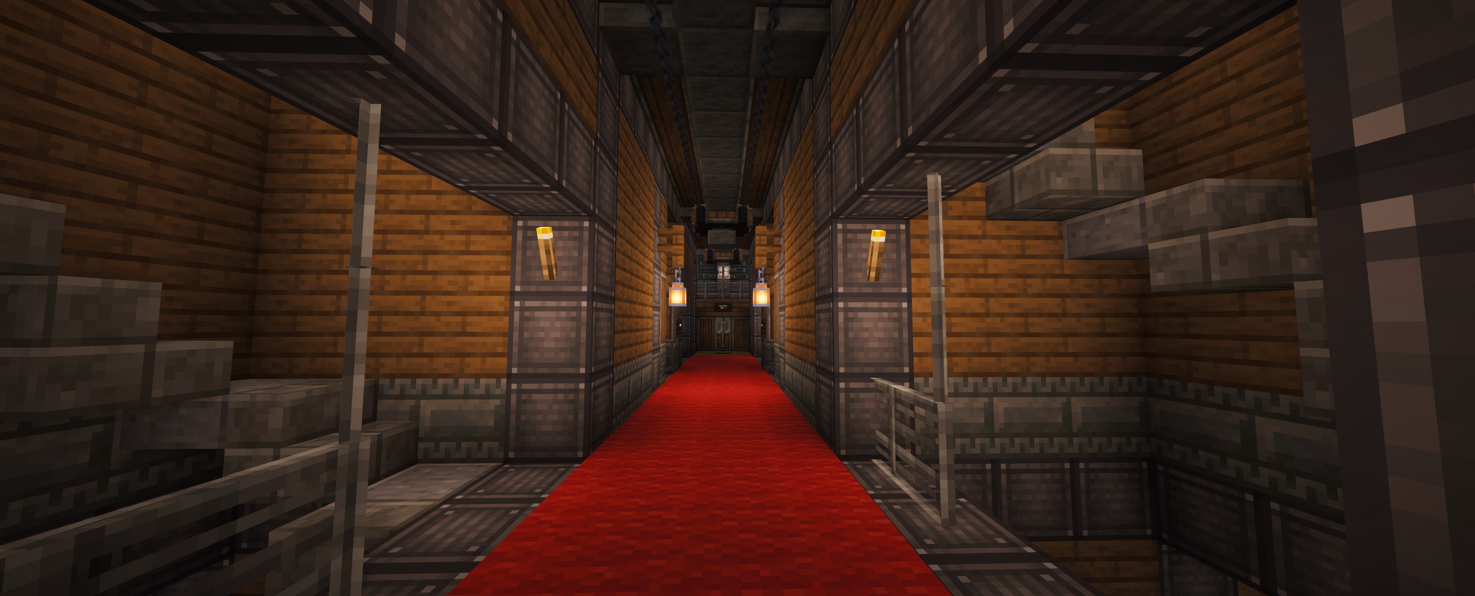 A long interior hallway features wood walls,