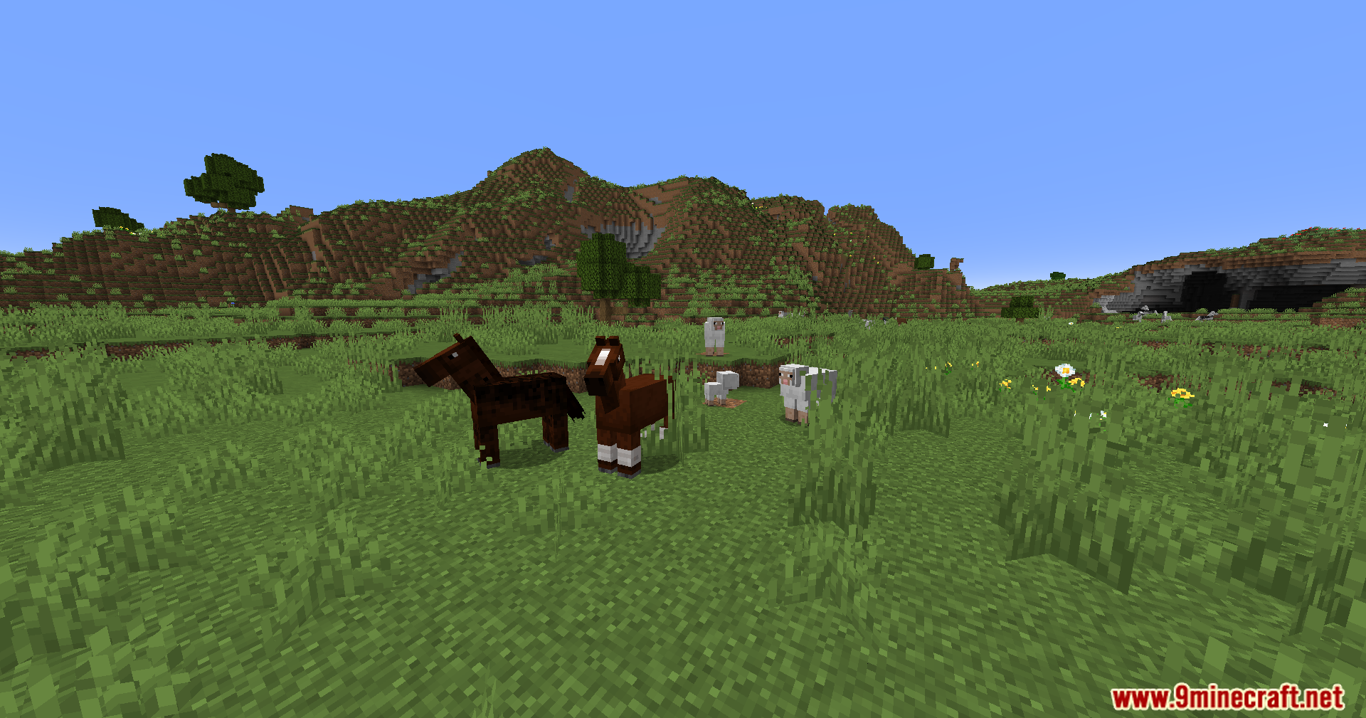 Noisiumed Mod Screenshot 9 Horses and sheep in a grassy field with hills in the background
