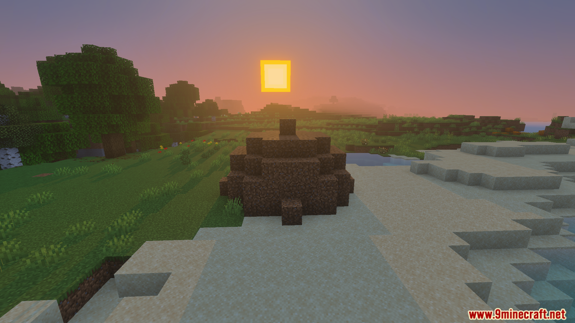 Not Enough TNT Addon Screenshot 7 A large pile of dirt blocks sitting on a sandy beach at sunset