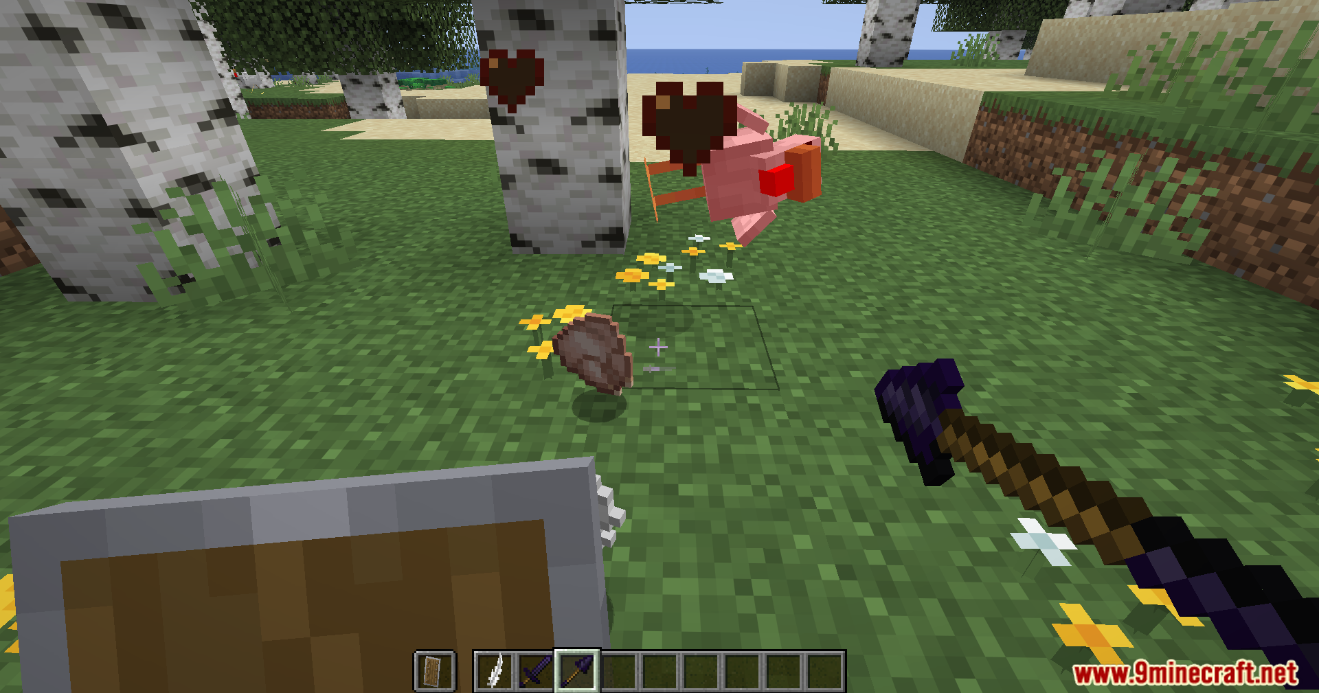 Player attacking a pig with an obsidian spear in a birch forest