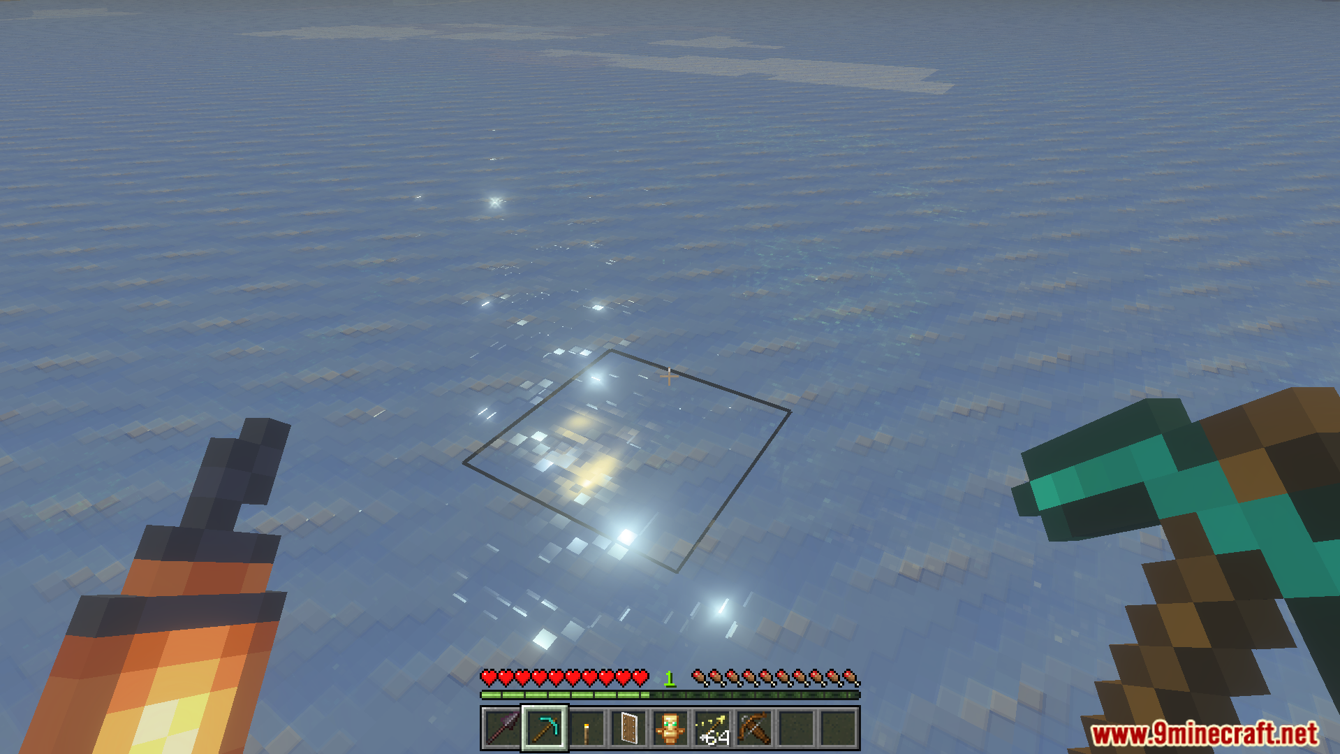 Player holding a torch in the offhand while mining ice