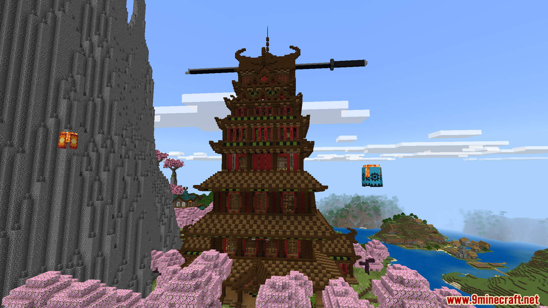 A tall traditional pagoda stands in an old Japanese town