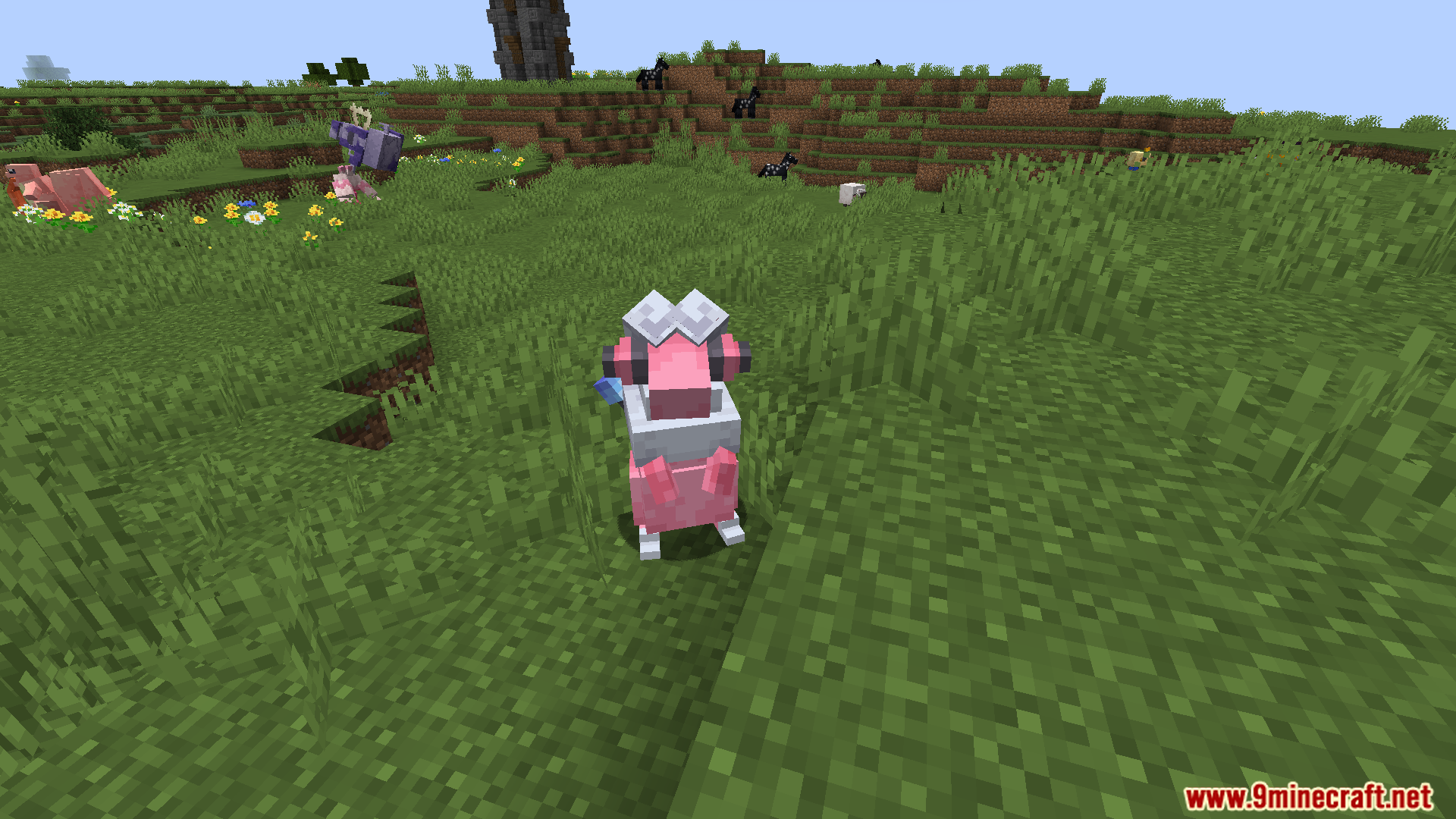 A pink creature with a silver crown stands tall