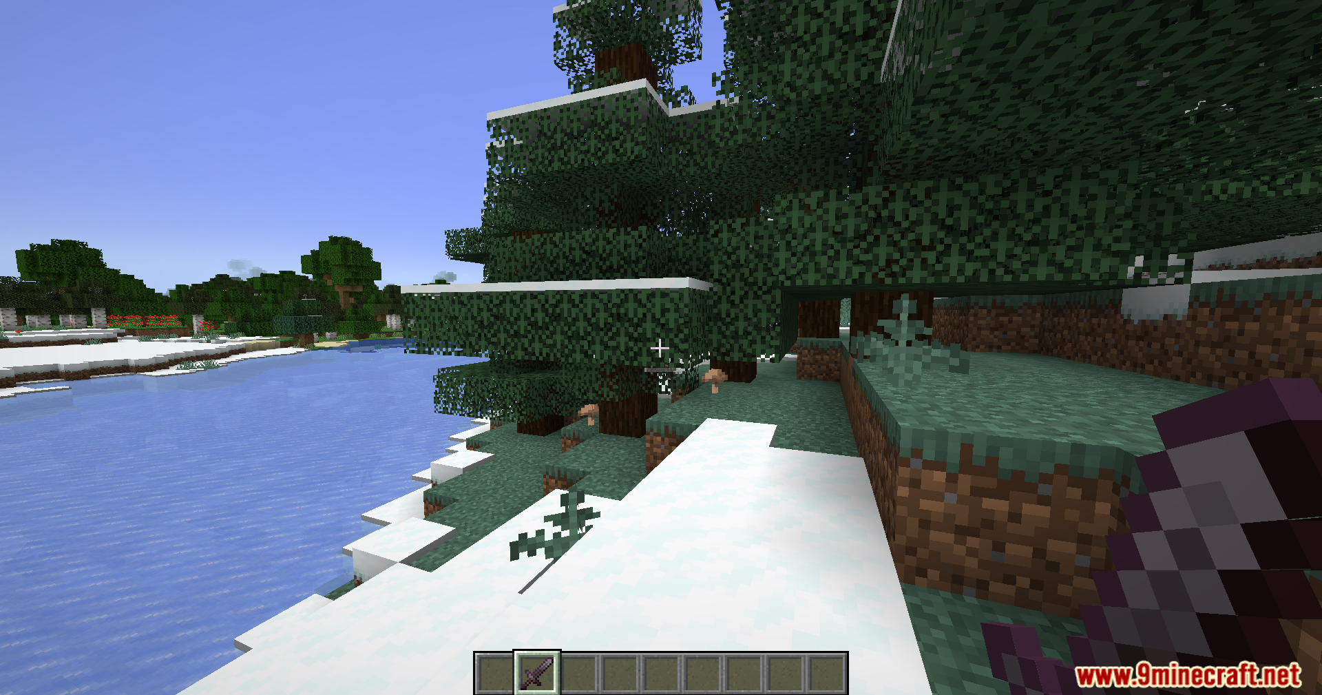 PVP Optimizer Mod Screenshot 3 Player stands in a snowy forest biome holding a netherite sword