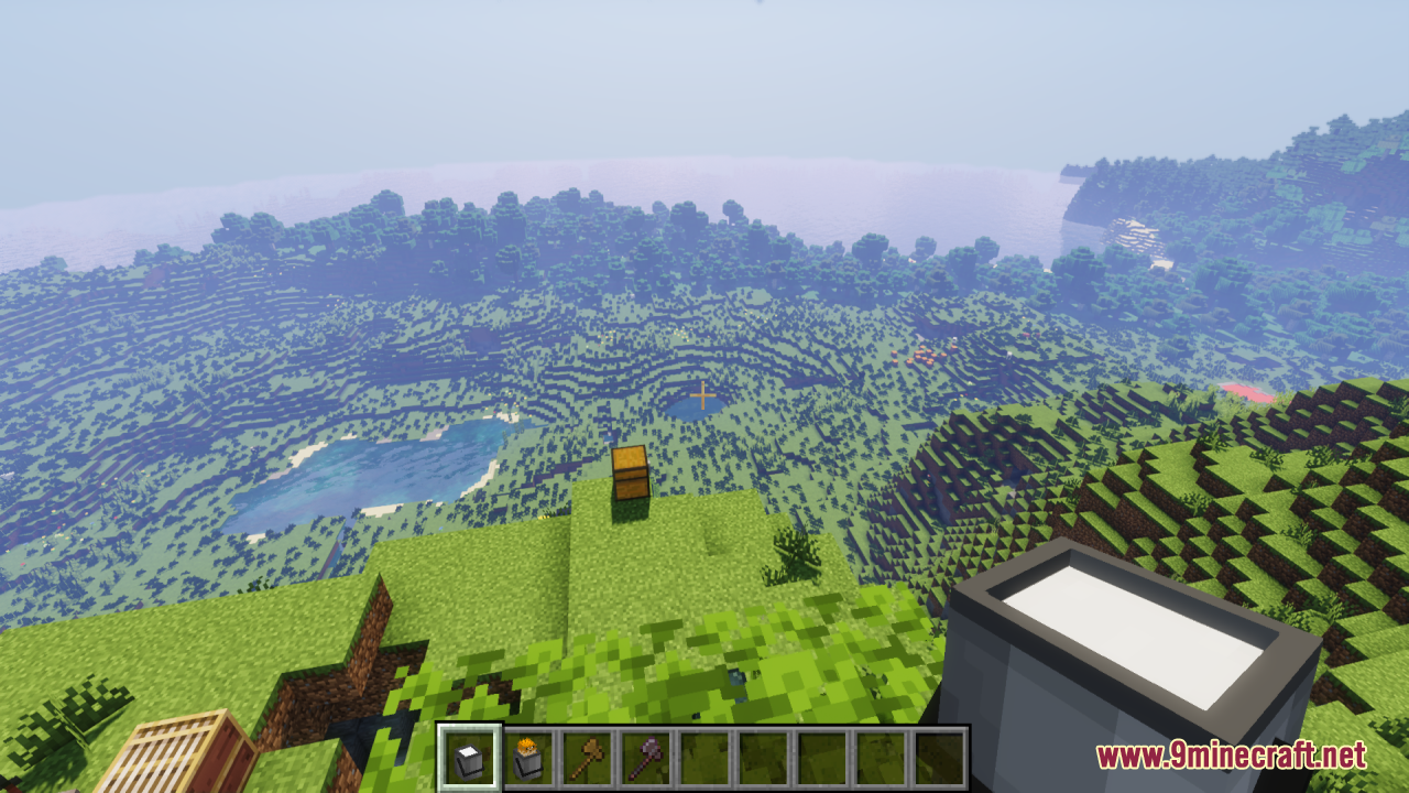 First person view holding a 3D bucket overlooking a valley