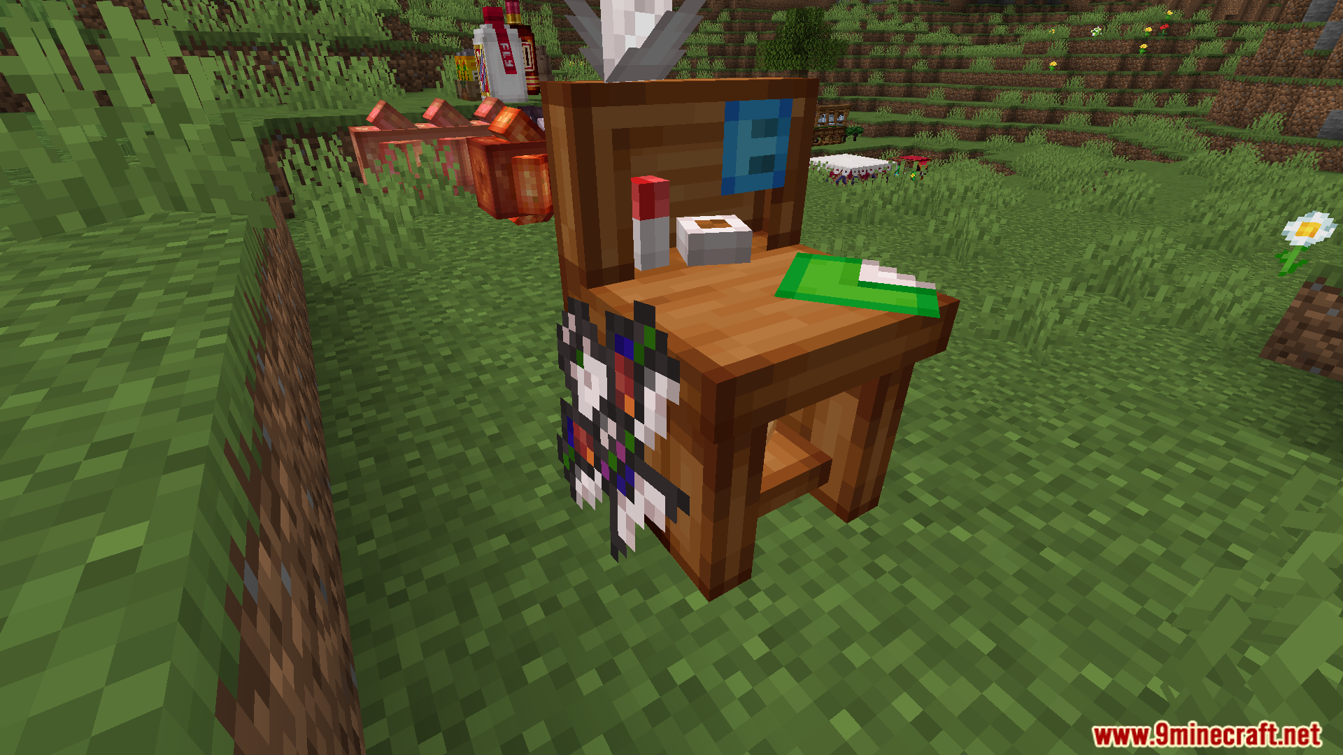 A wooden vanity with lipstick and other decorative items