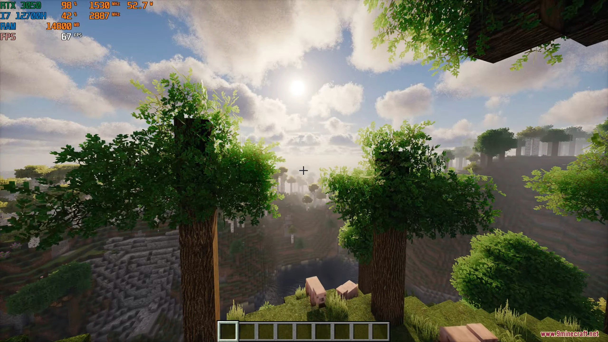 Scenic landscape view featuring realistic trees and pigs under a bright sun