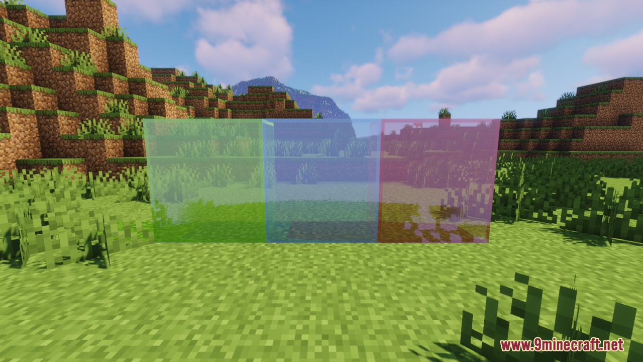 Perfect Clear Glass Resource Pack Screenshot 10 Green blue and red clear stained glass blocks placed in a grassy area