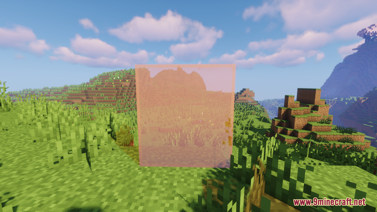 Perfect Clear Glass Resource Pack Screenshot 7 Large clear pink stained glass wall in a grassy Minecraft landscape