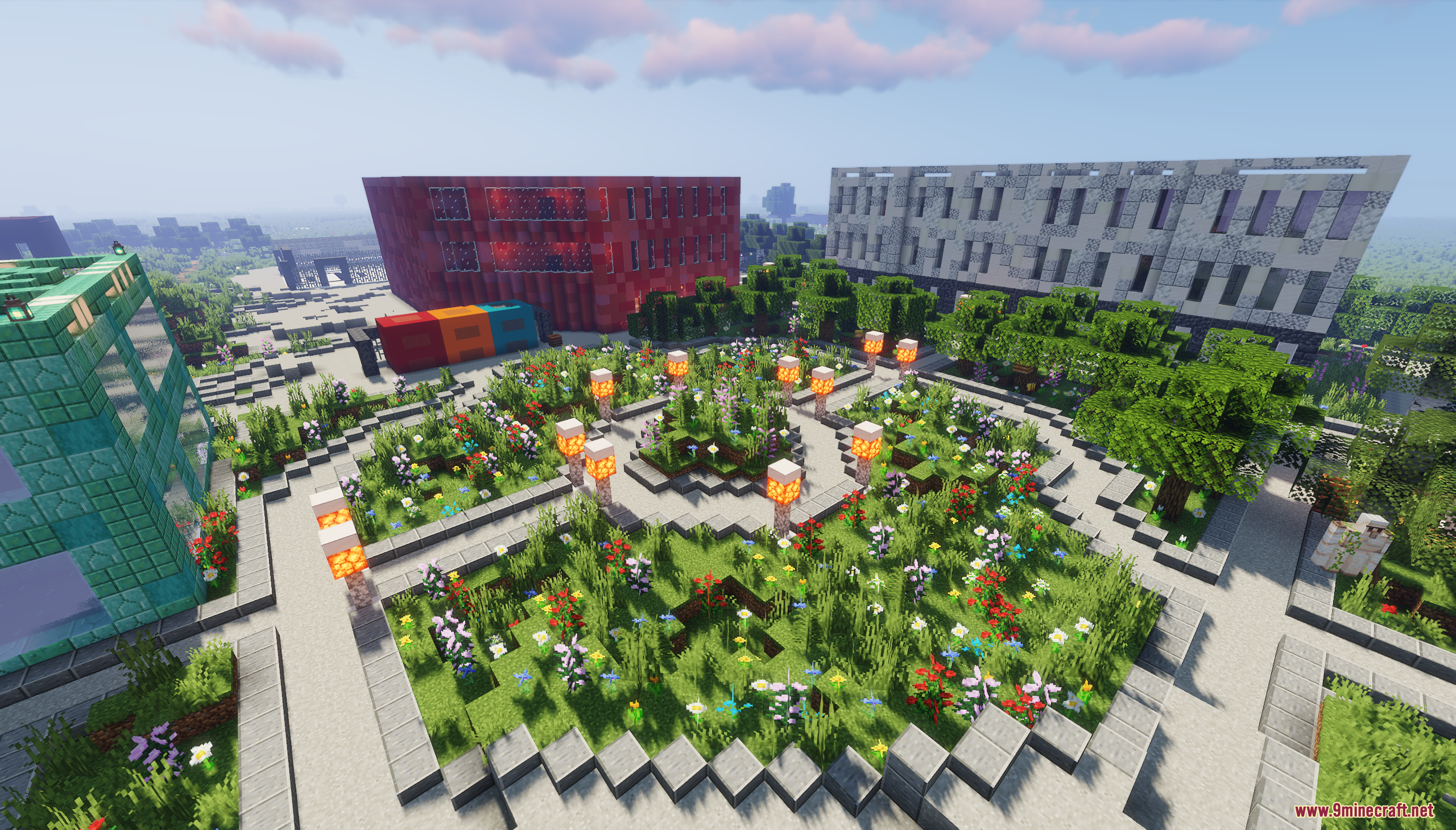 Landscaped city garden square with flowers walkways and glowing lamps near modern buildings