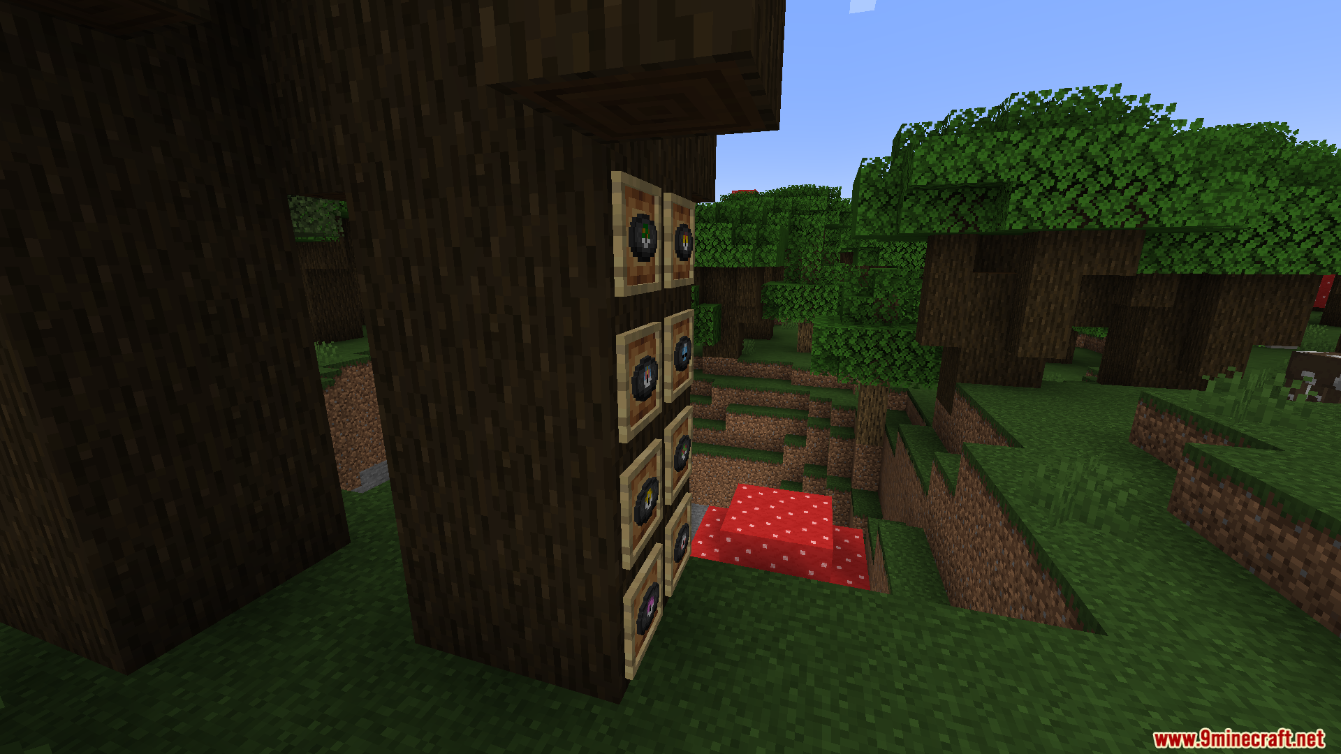Poke Discs Resource Pack Screenshot 11 Custom themed music discs displayed inside item frames on a tree trunk