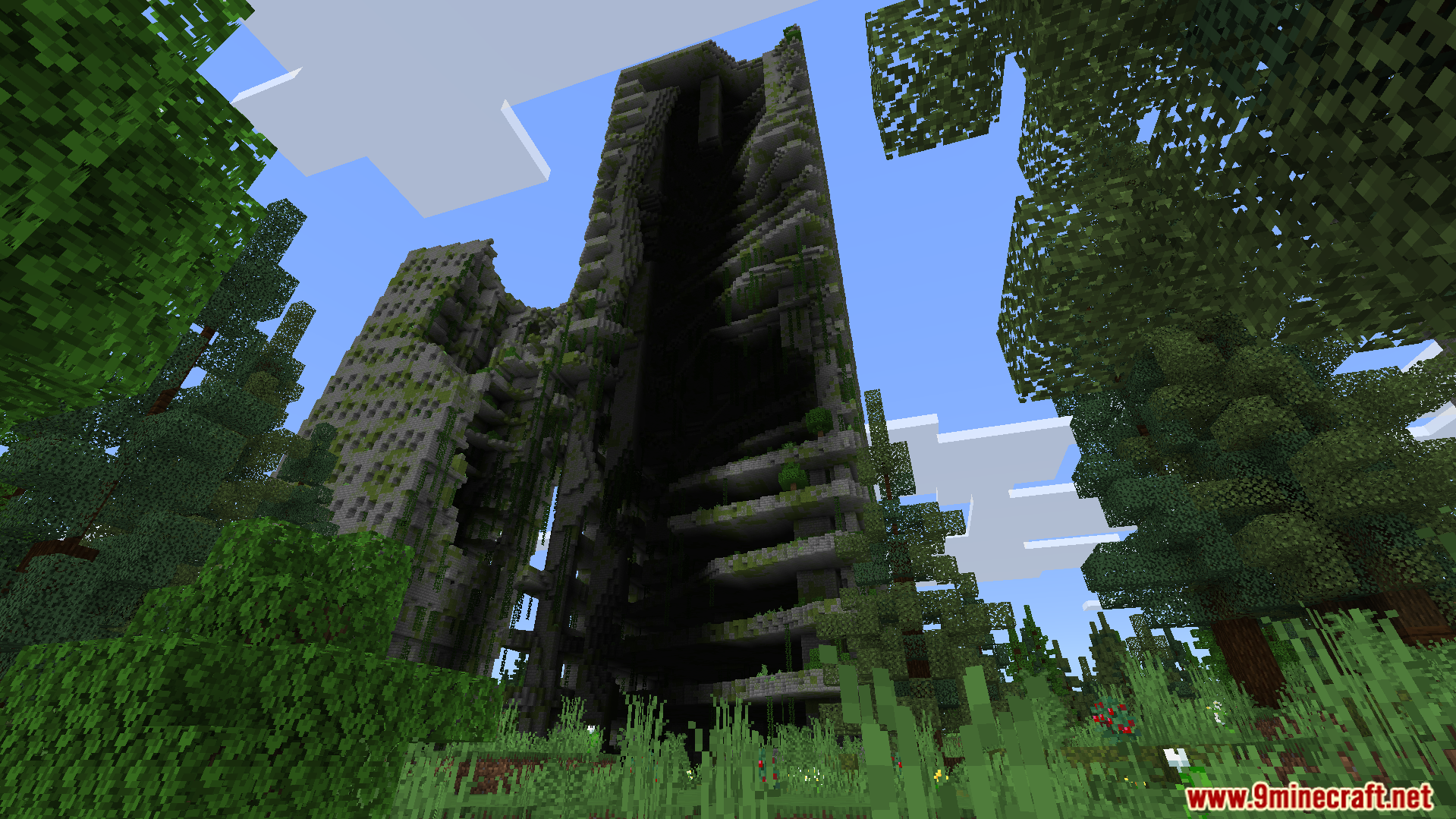 A massive abandoned building crumbles within the ruined urban landscape