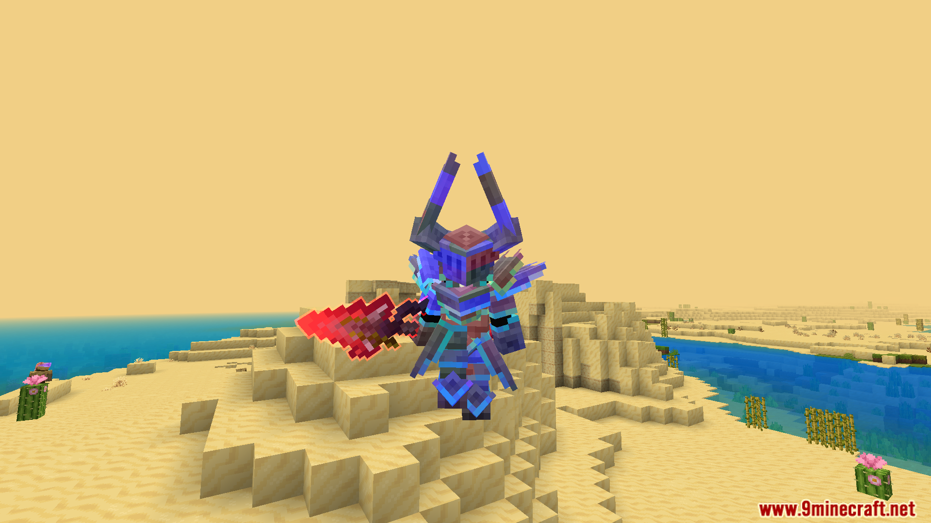 Player wearing custom horned armor and holding a glowing red sword in desert