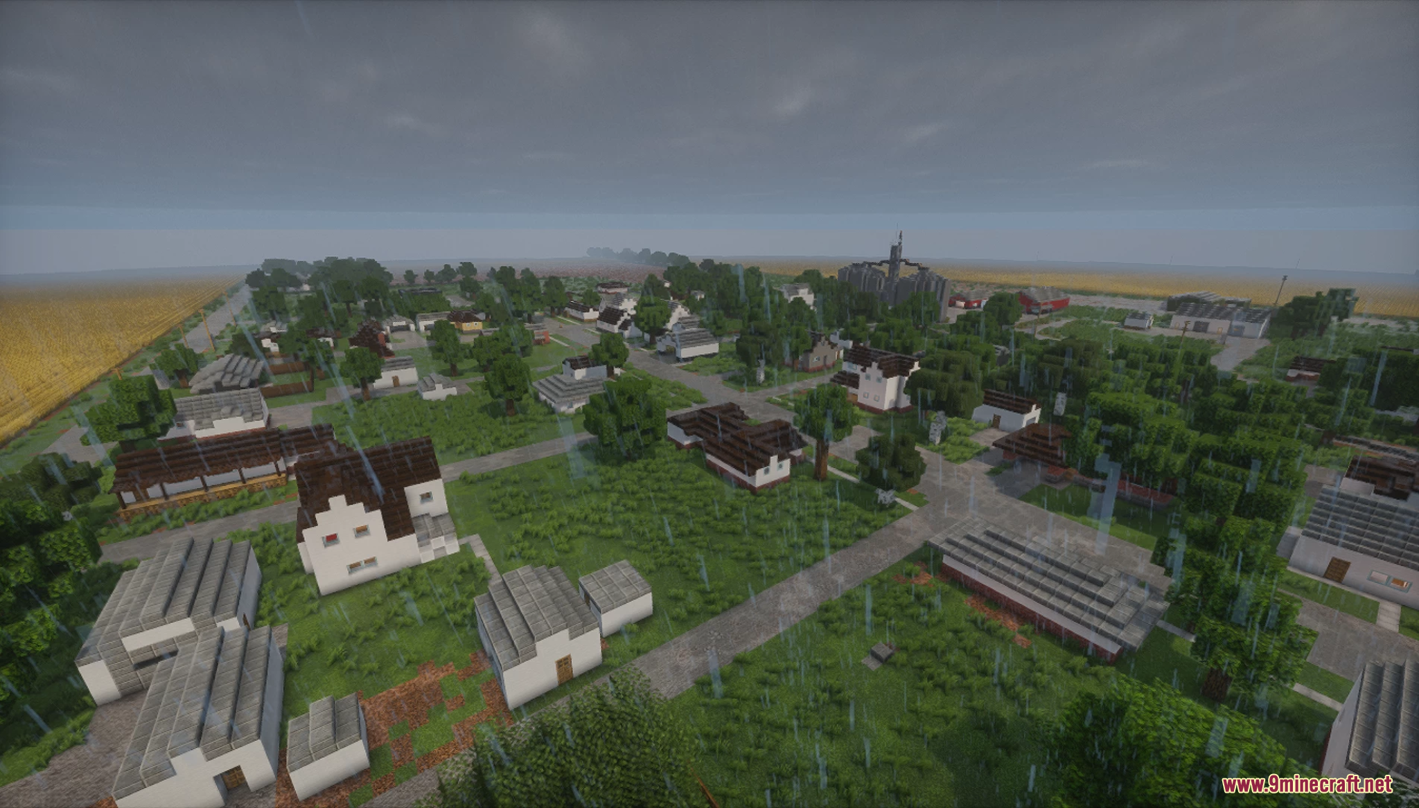 Overcast, rainy weather over a small suburban town