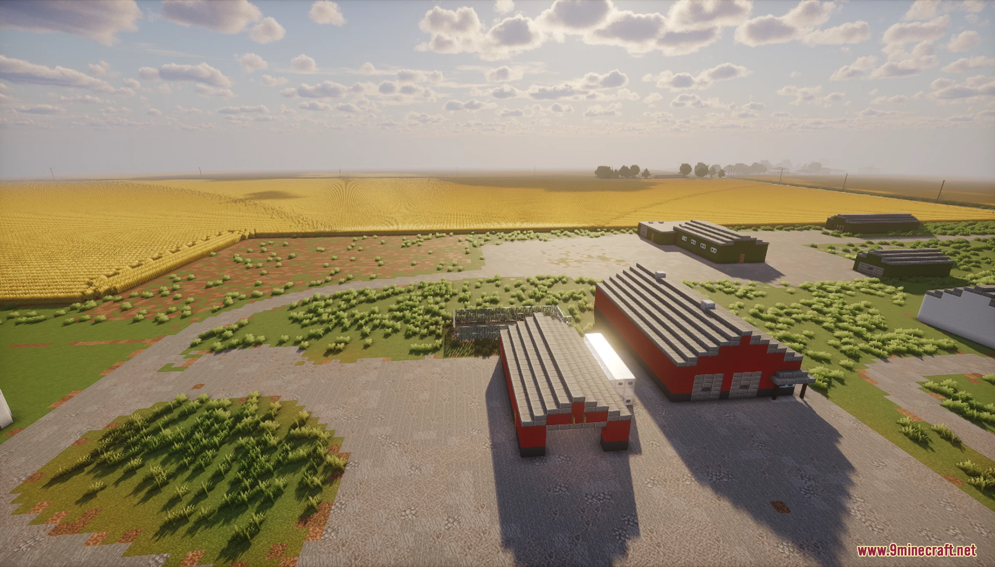 Realistic farm with large golden fields and red barns