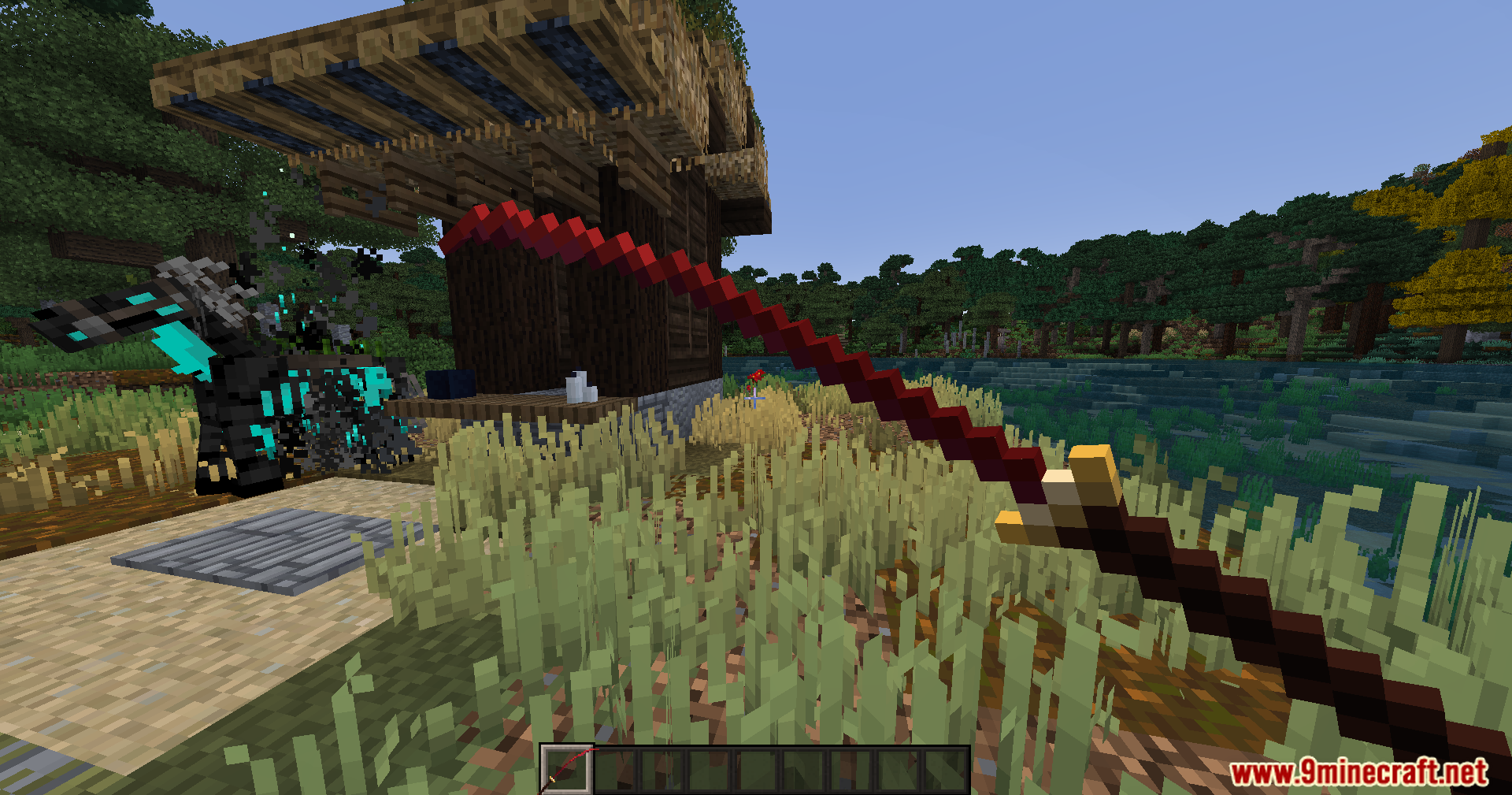 Sengoku Jidai Mod Screenshot 14 Player wielding a long red sword near a Japanese building in Sengoku Jidai Mod
