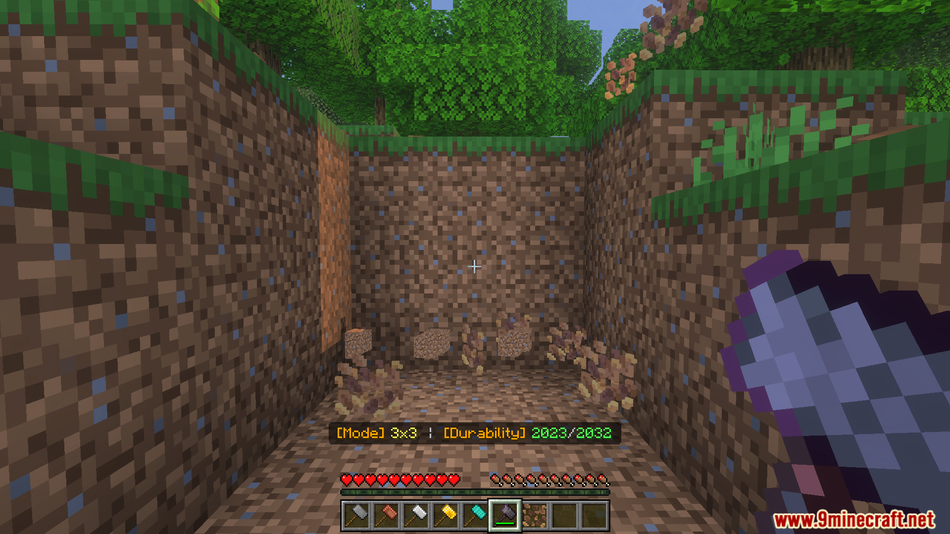 Player using Netherite Hammer to mine a 3x3 area of dirt