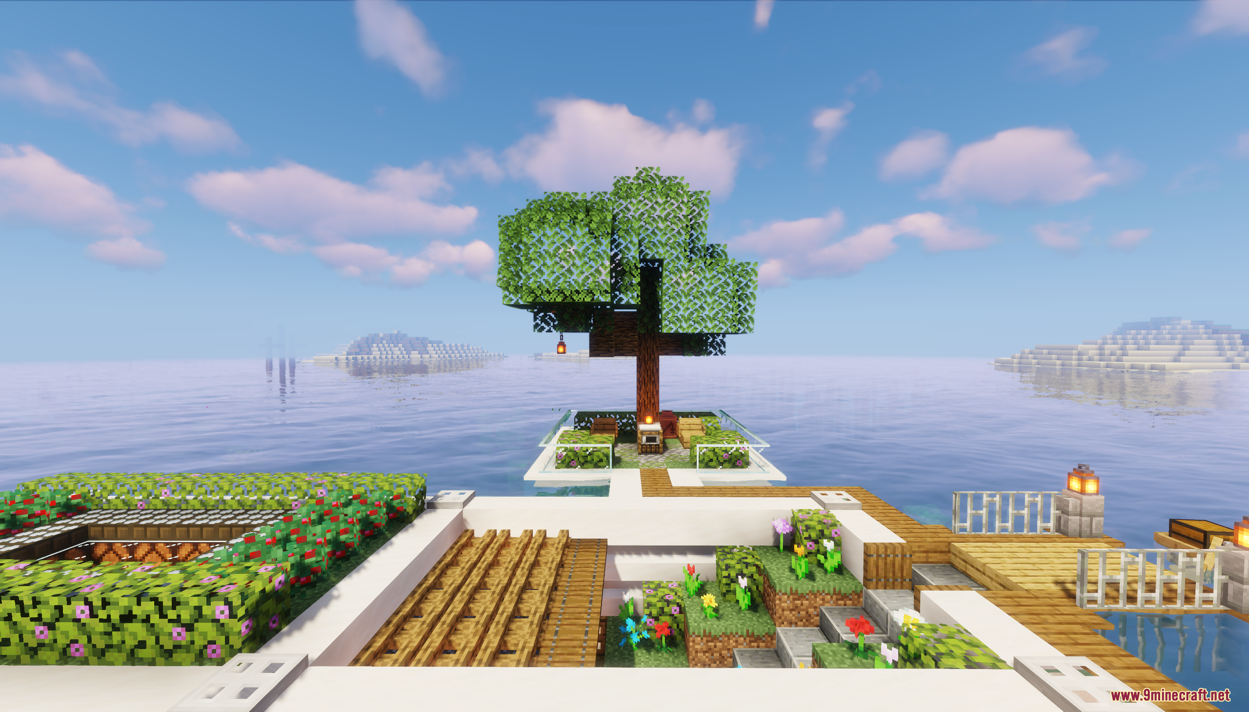 A large tree grows on the central platform of the base