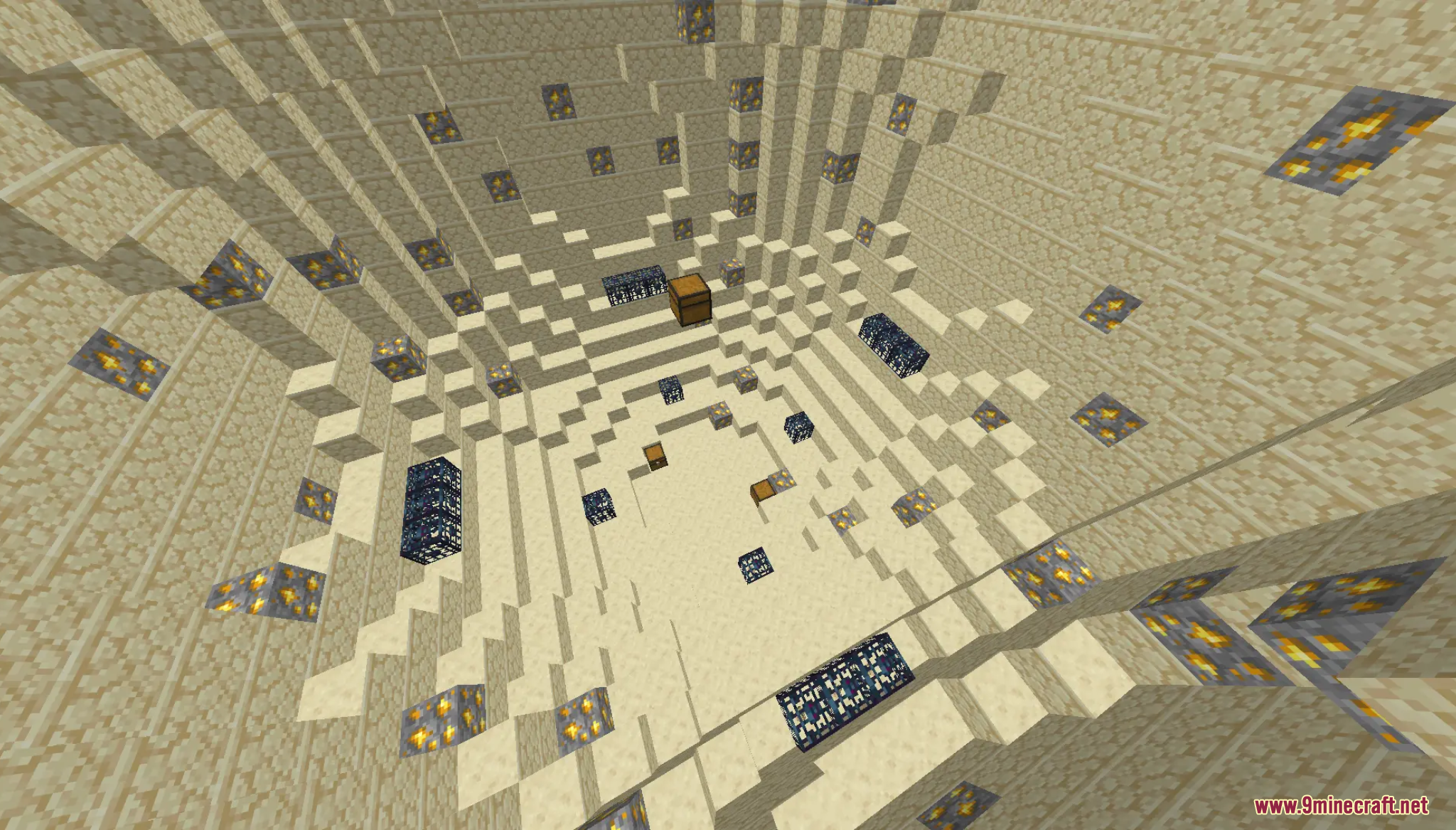 A deep sandstone dungeon with spawners and gold ore