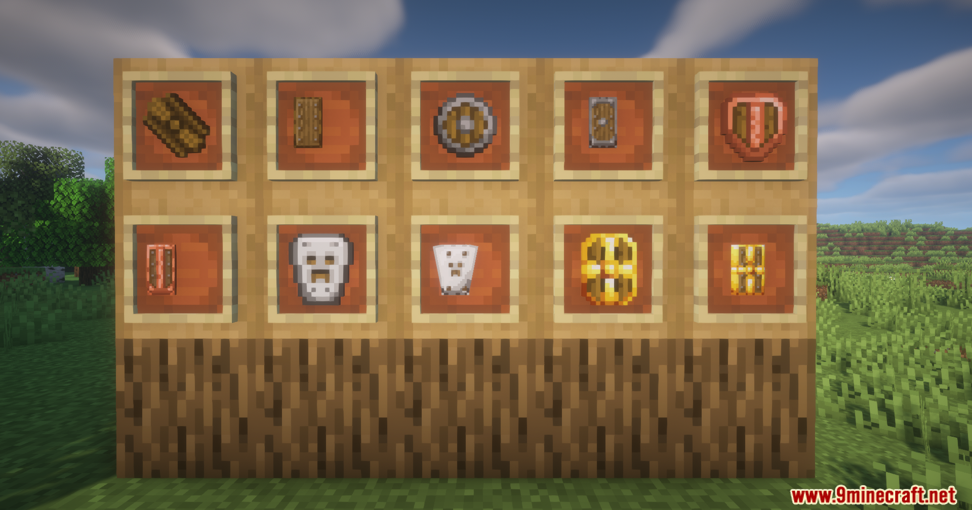 Various custom shields displayed in item frames on wooden blocks