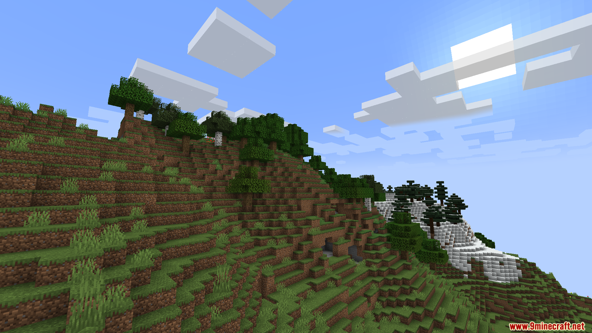 Starlight with Create Fix Mod Screenshot 9 A steep green hillside with trees next to a snowy mountain