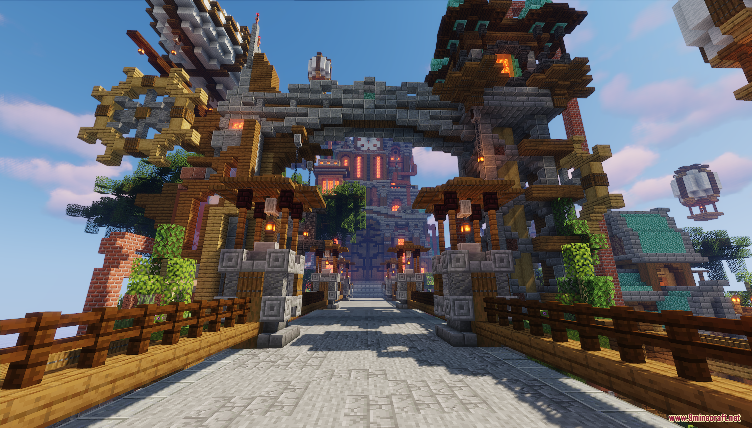 A detailed stone bridge leading towards an ornate city gate