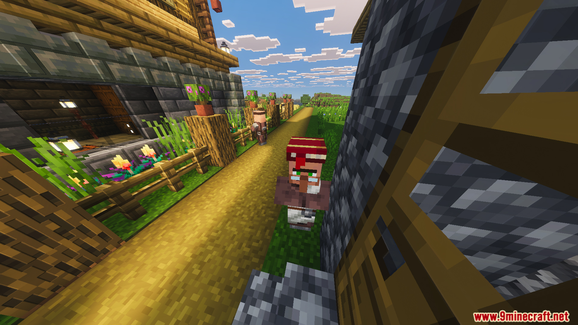 Villager standing on a path right next to the two story wooden house