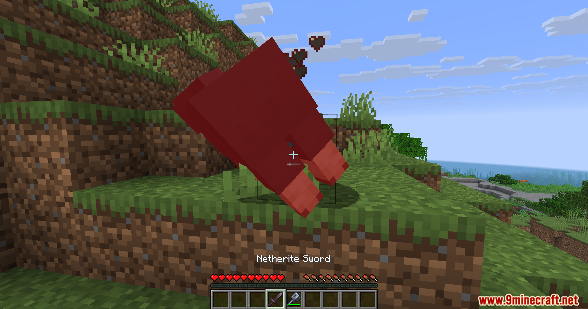 Player attacking a red sheep with a Netherite Sword