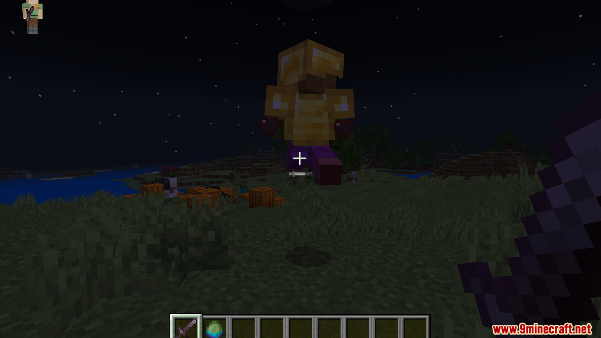 A player prepares to fight a zombie in golden armor