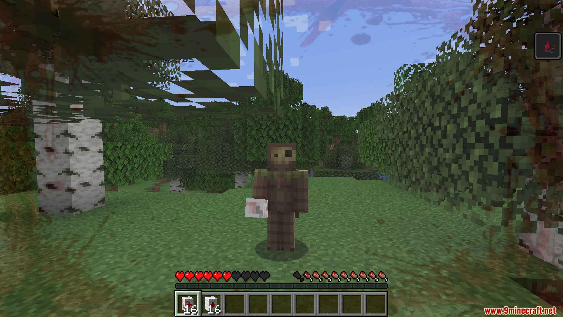 TaCZ Bleeding Mod Screenshot 8 Player standing in a forest holding a medical bandage while bleeding