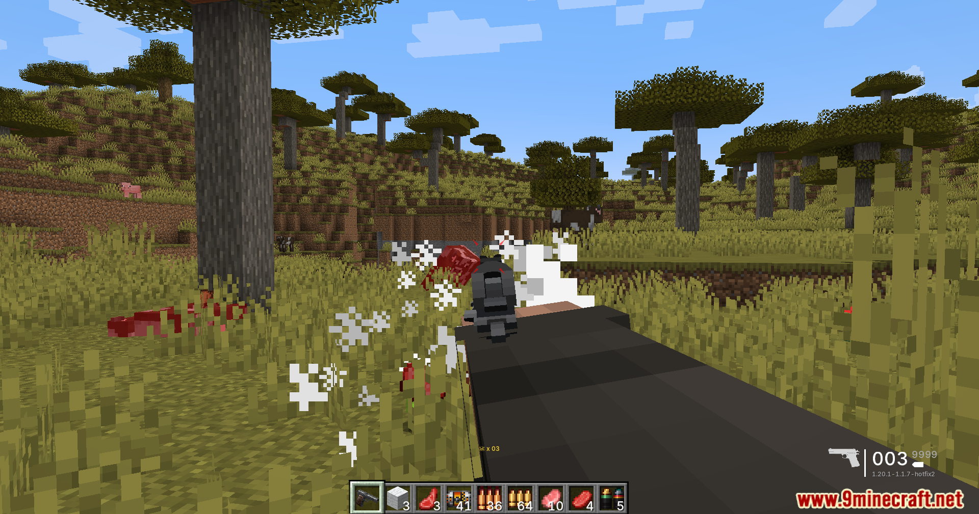 TaCZ Bullets Back Mod Screenshot 11 Player shooting a black pistol with smoke particles in a savanna biome