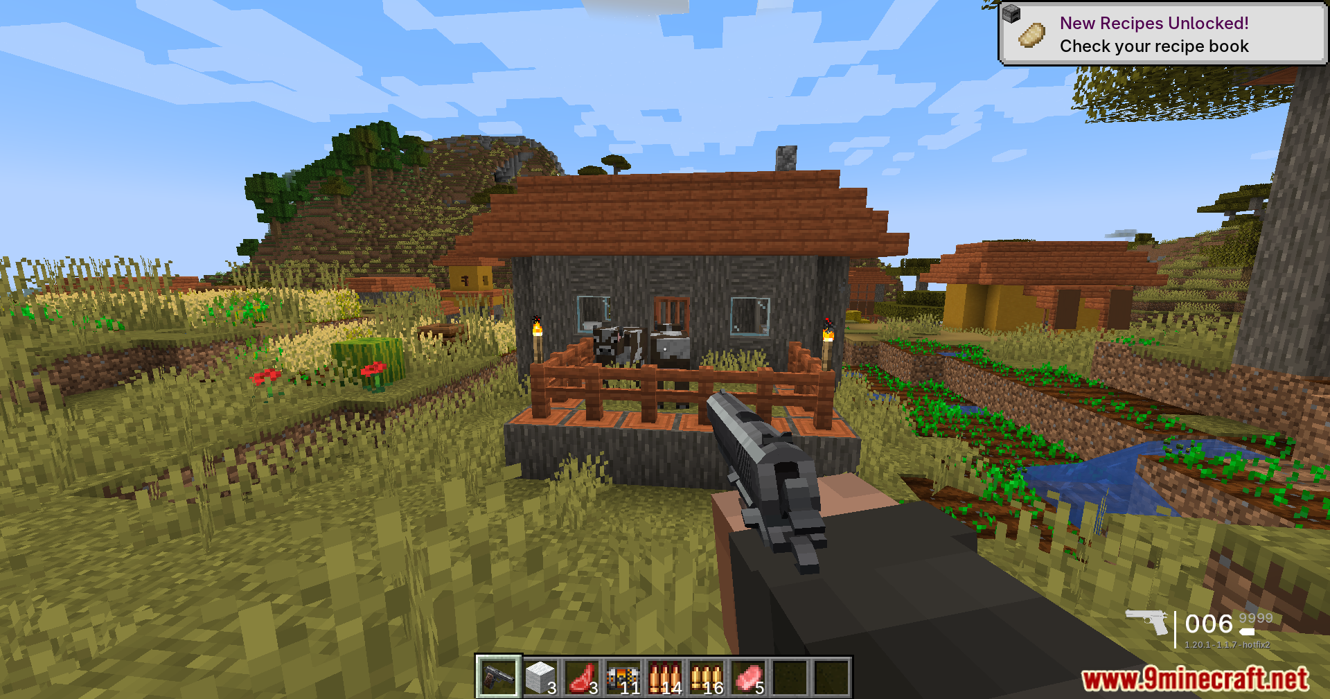 TaCZ Bullets Back Mod Screenshot 4 Player aiming a gun at cows inside a fenced pen near a village