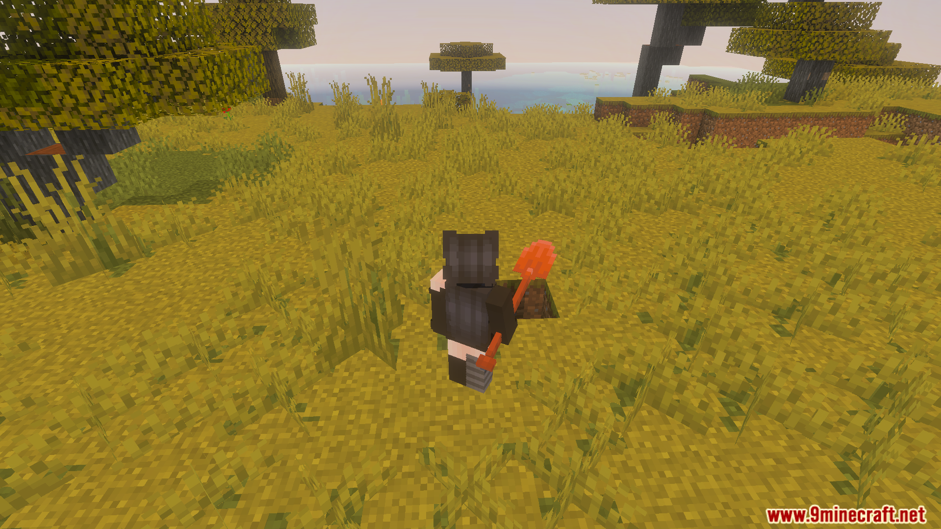 Tactical 3D Tools and 3D Weapons Pvp Texture Pack Screenshot 6 A player character holding a detailed three dimensional shovel in a savanna