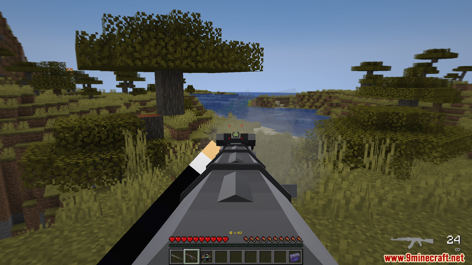 Aiming a rifle down sights across a river