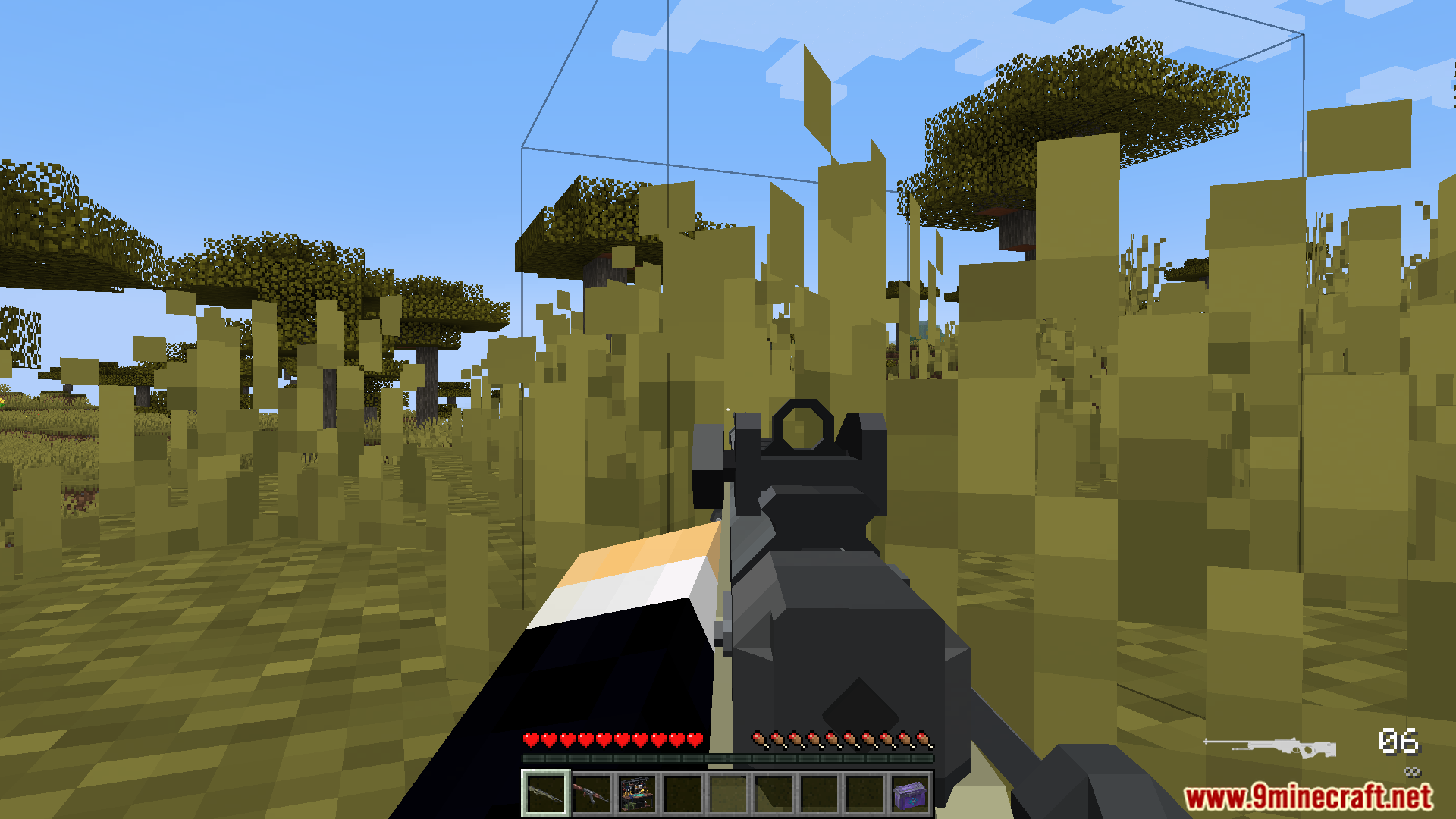 Player aiming a rifle in a grassy field