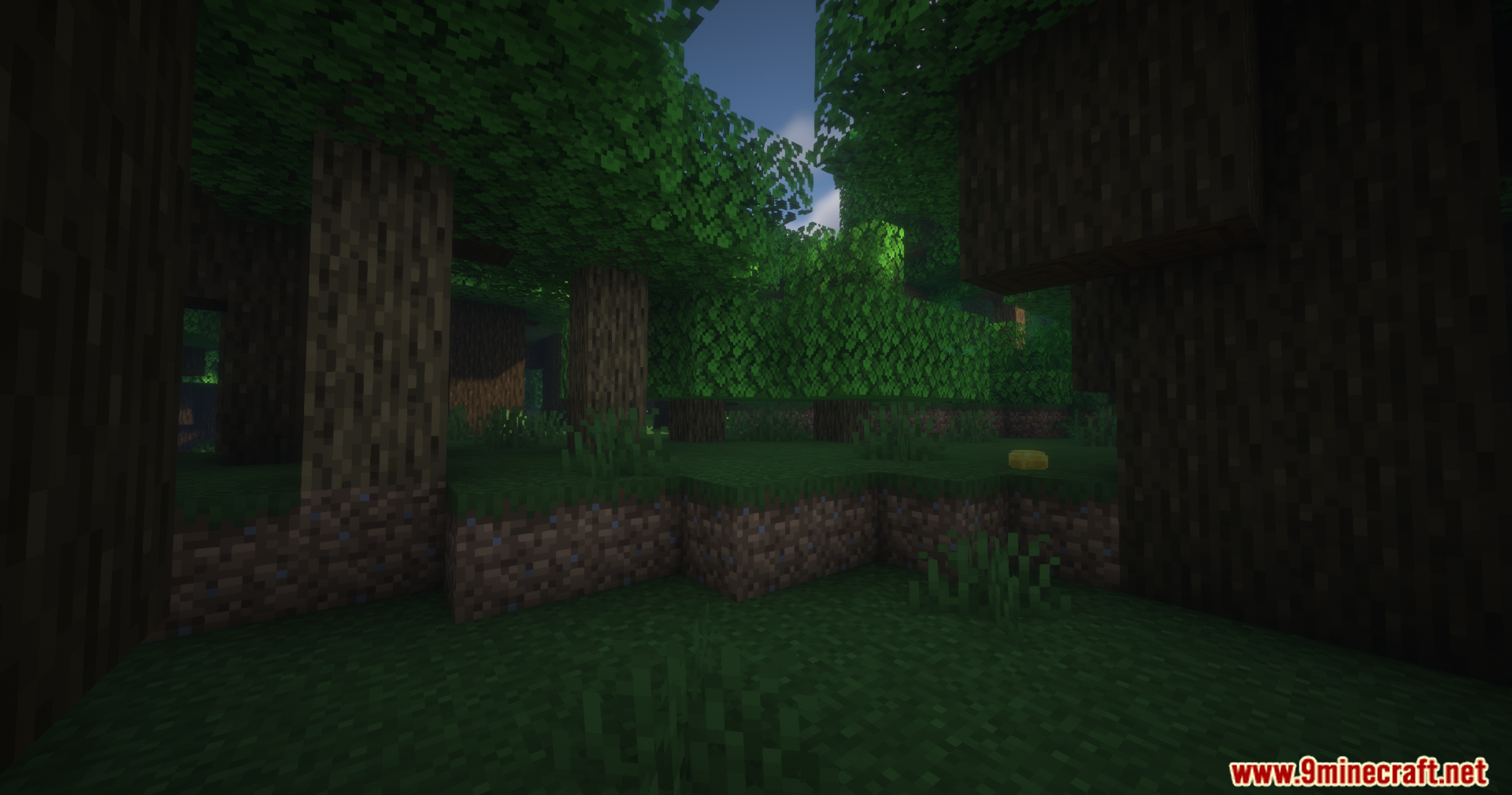 Tensura Compat Ftb Mod Screenshot 9 Sunlight filtering through the leaves in a dark Minecraft forest