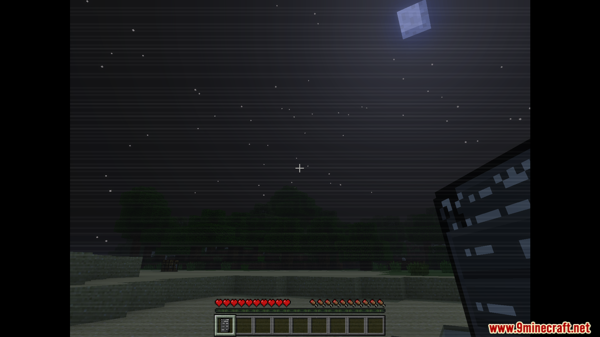 The Shattered Command Addon Screenshot 9 player holding config item with creepy vhs overlay on screen at night
