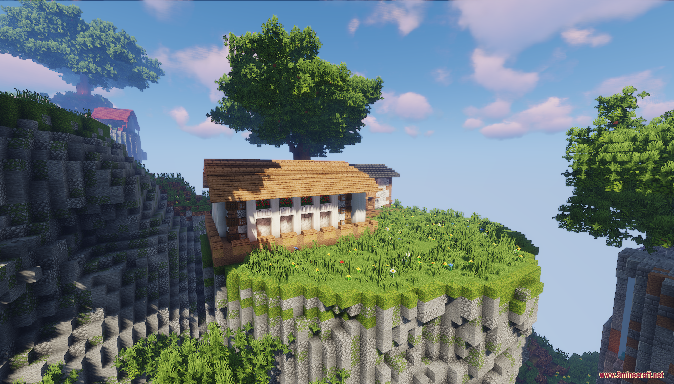 A rustic house built on a grassy cliffside island