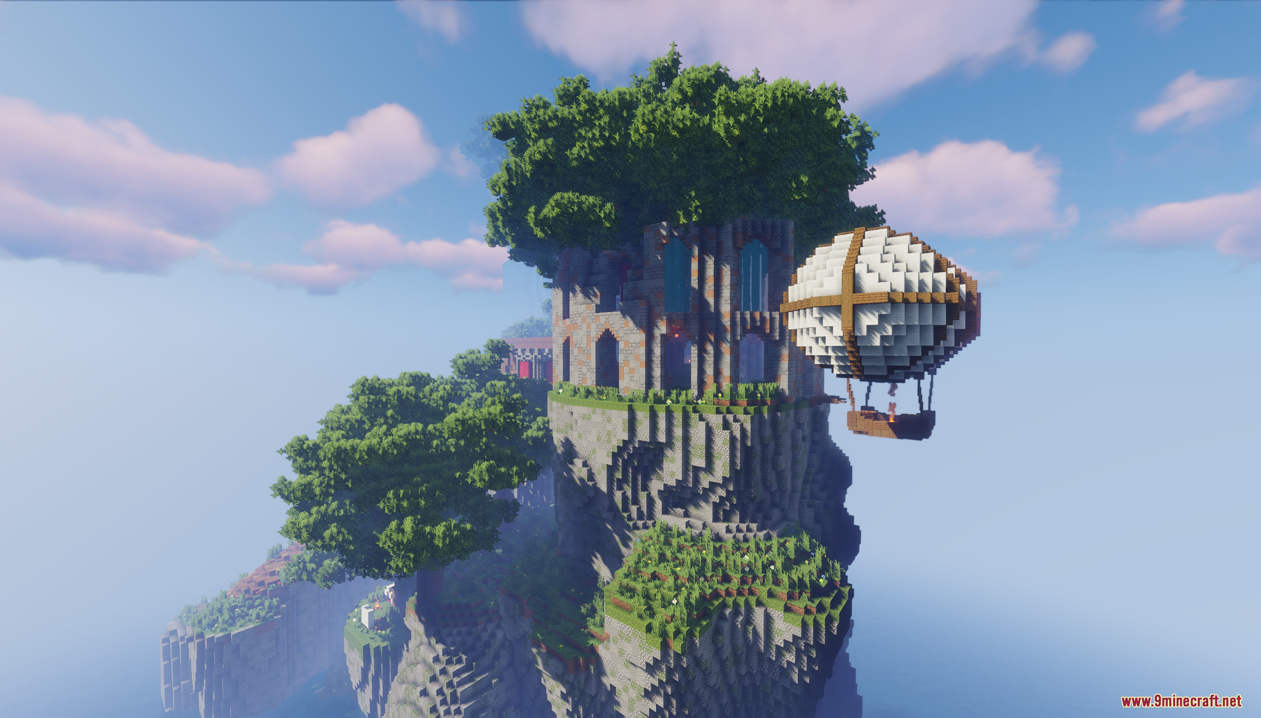 A large cliffside castle with a hot air balloon nearby