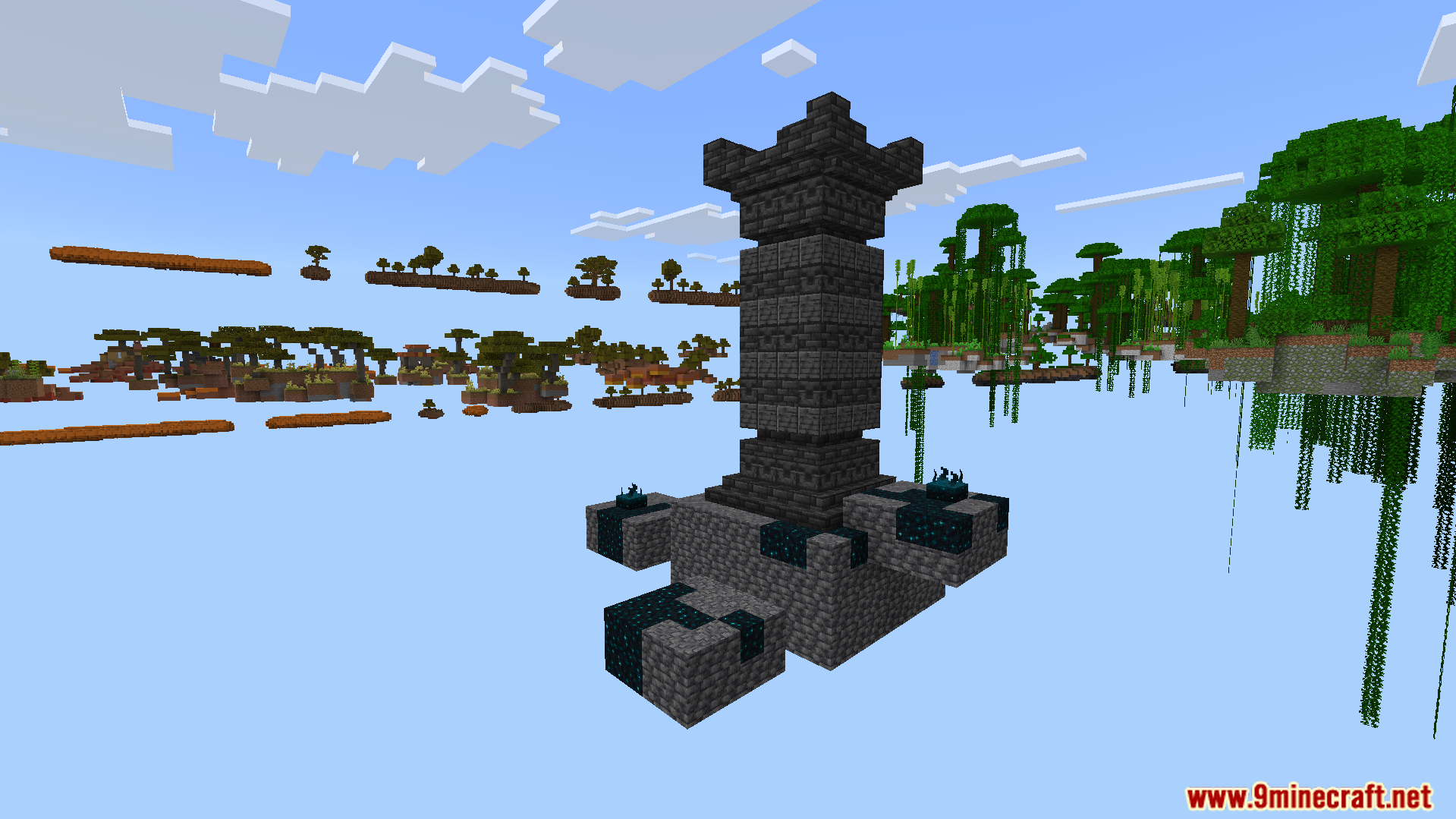 A custom stone tower structure floats among the skyblock islands