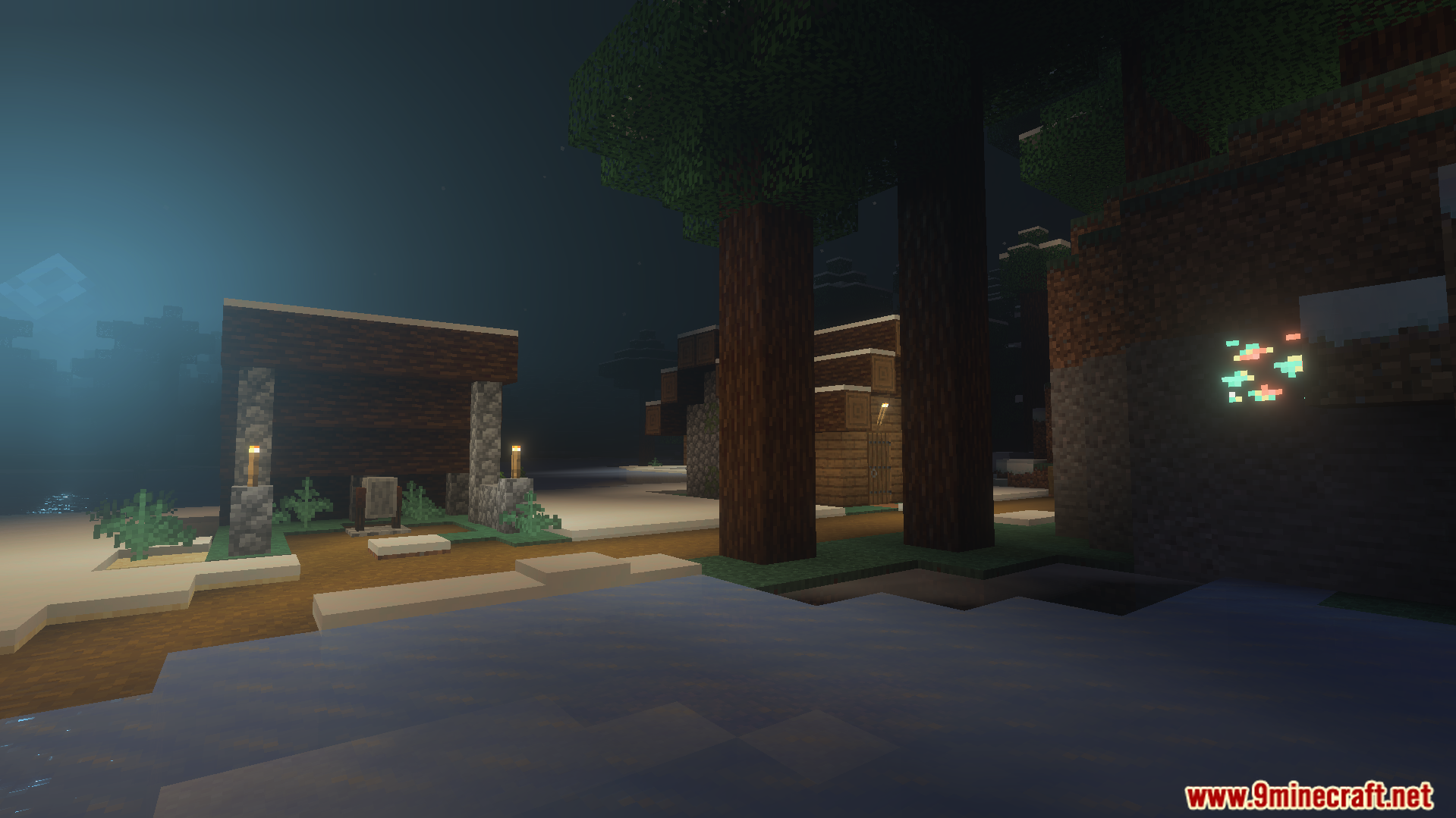 Vibrant Shader Screenshot 3 Nighttime view of a village with glowing ores and lanterns
