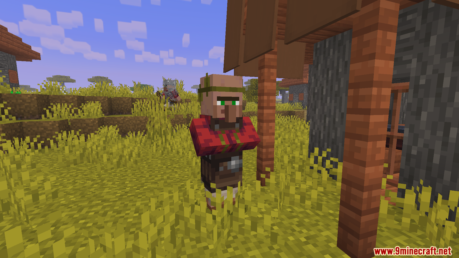 worker villager wearing a red shirt and tool belt in the grass