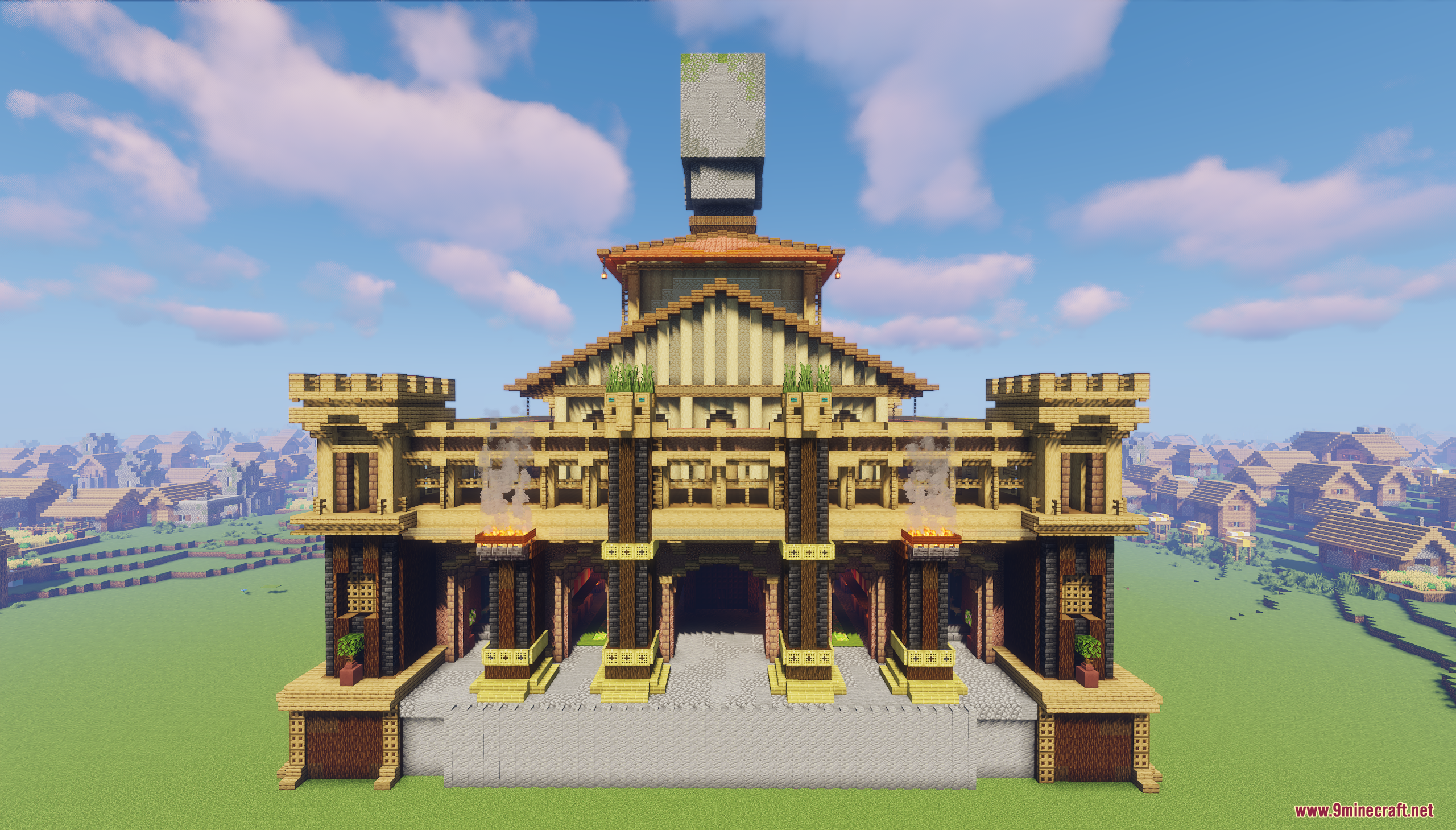 Large symmetrical building with central tower and multiple entrances