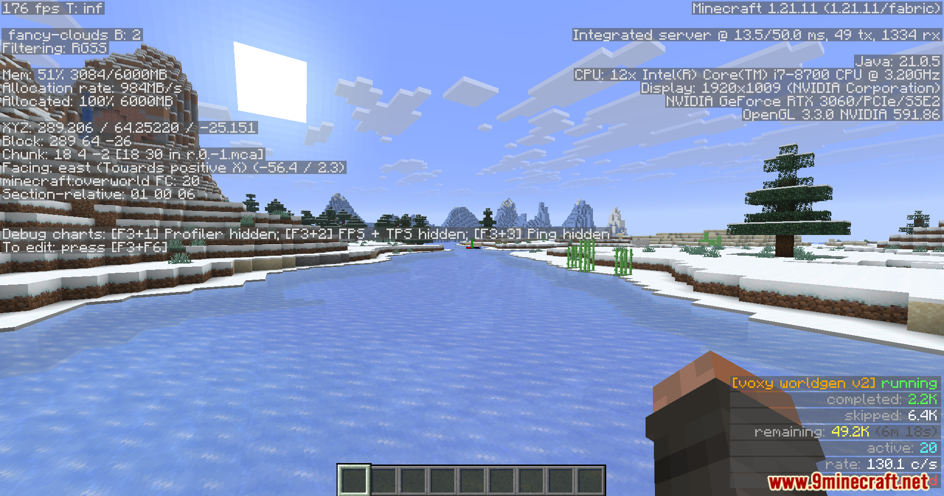 Snowy river landscape showing active background chunk generation progress on screen