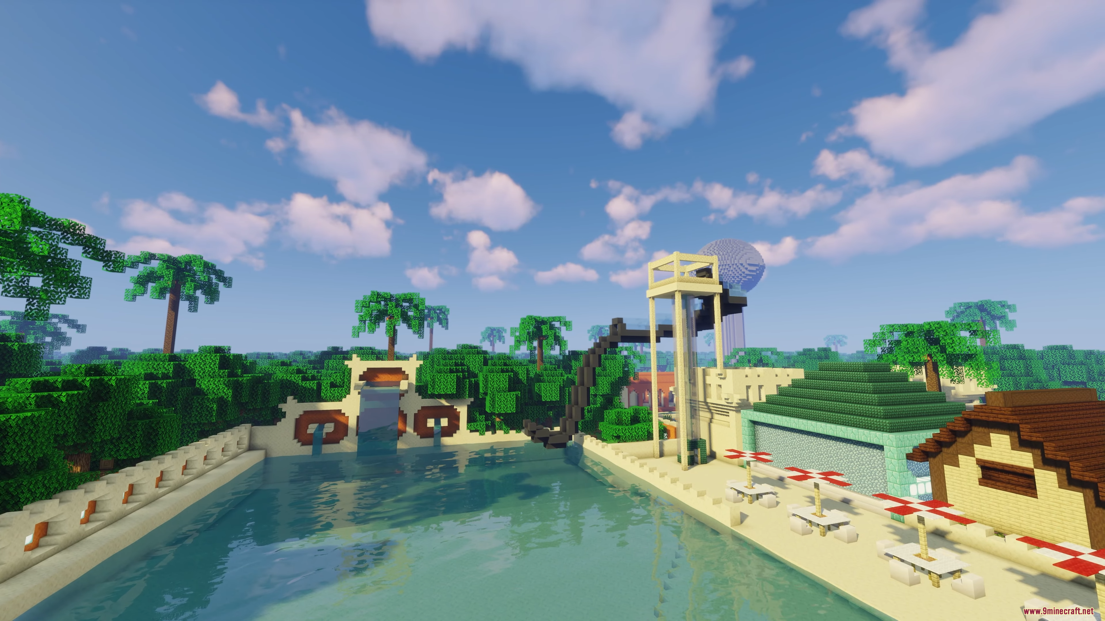 A relaxing pool area with palm trees and park buildings