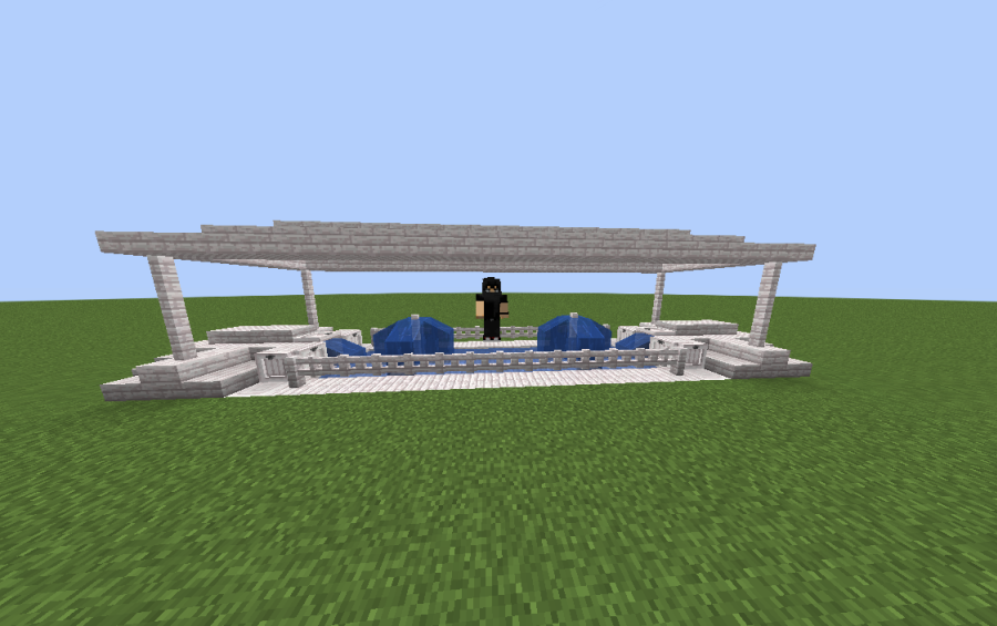 A player standing inside a large white pale wood fountain structure